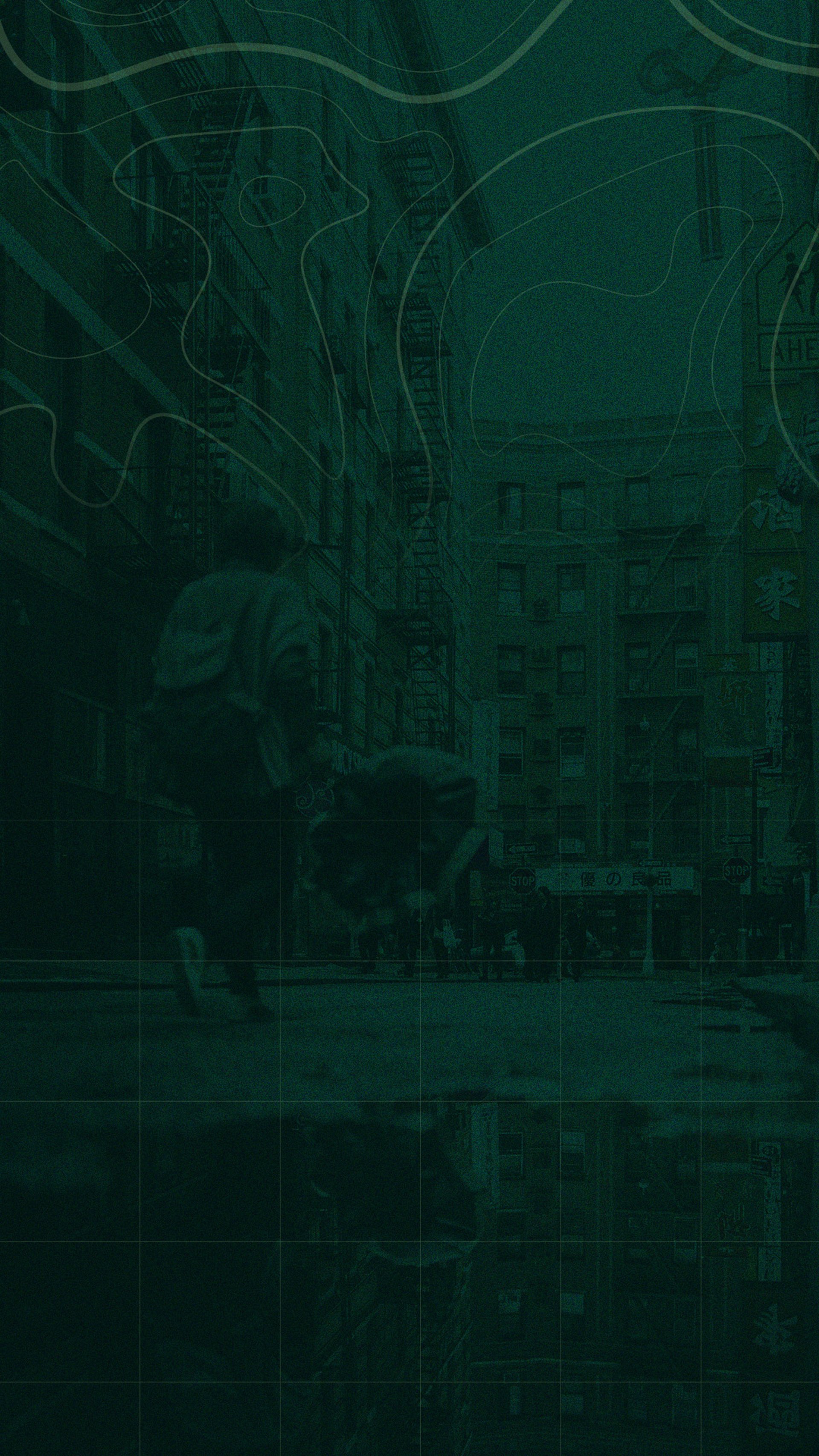 an abstract photo of a curved building with a blue sky in the background