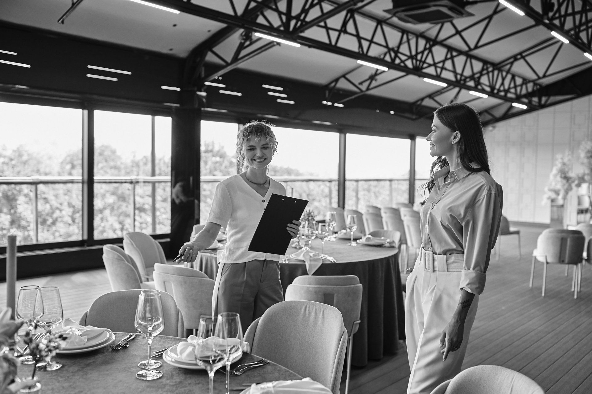 an abstract photo of a curved building with a blue sky in the background