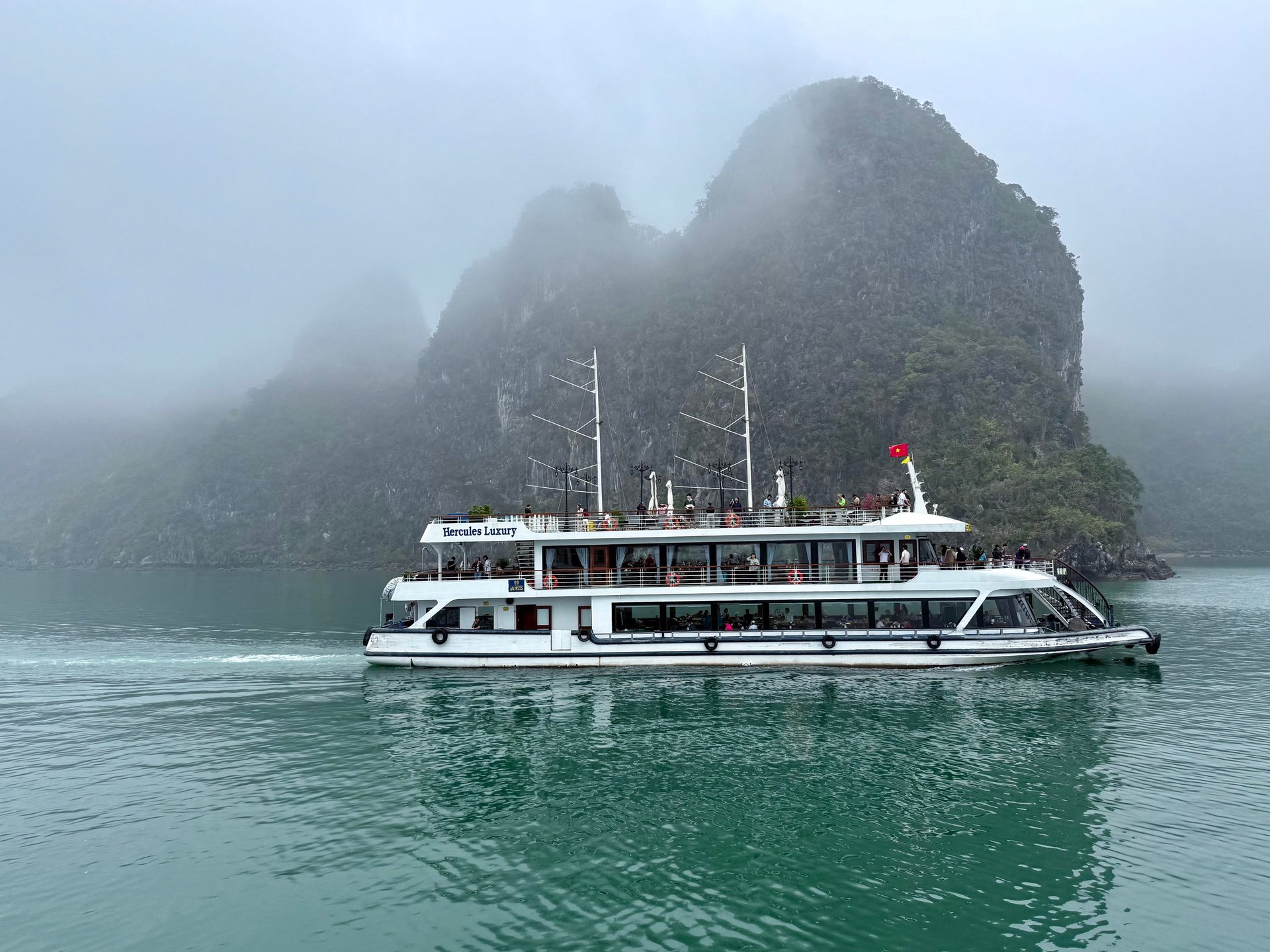 an abstract photo of a curved building with a blue sky in the background