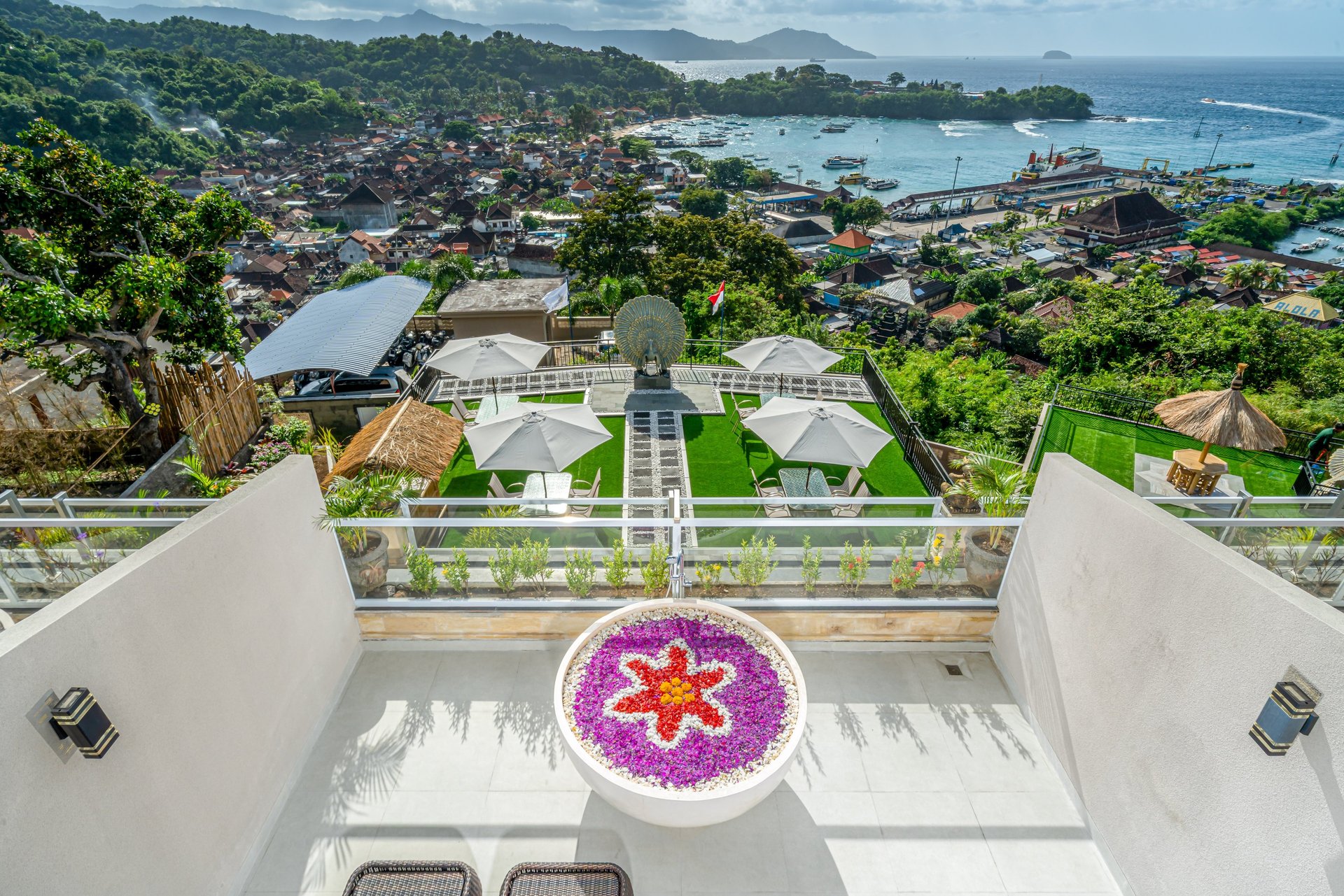 brown and white wooden house near swimming pool during daytime
