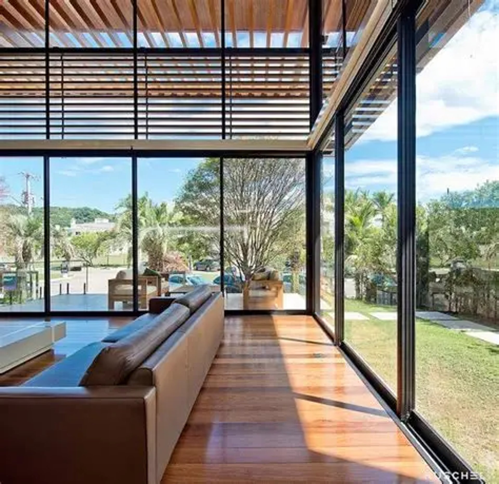 black and brown leather padded tub sofa