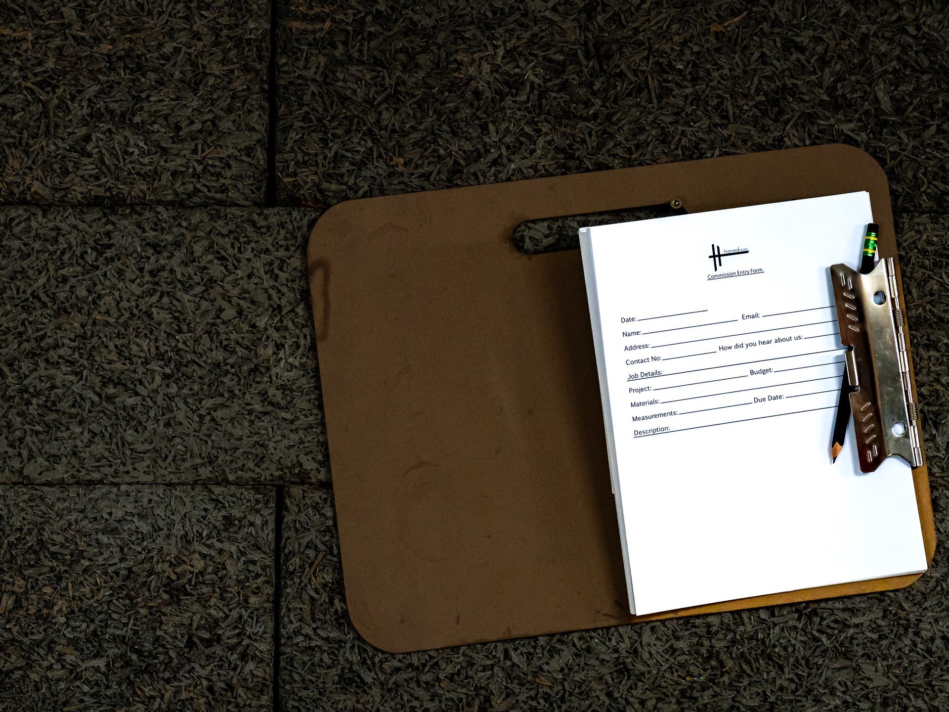 an abstract photo of a curved building with a blue sky in the background