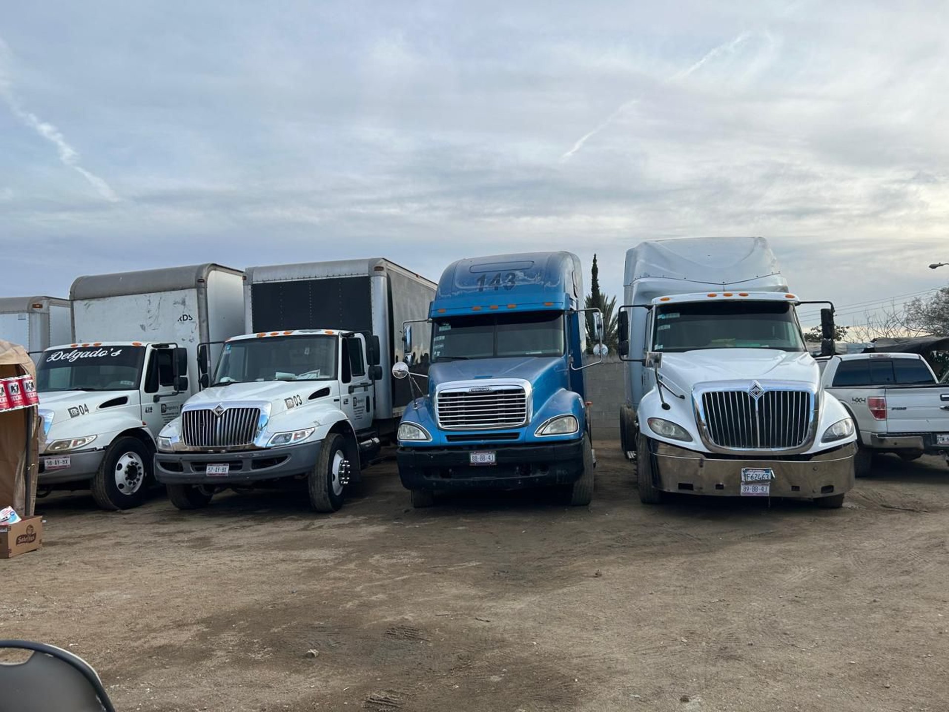 black and brown leather padded tub sofa