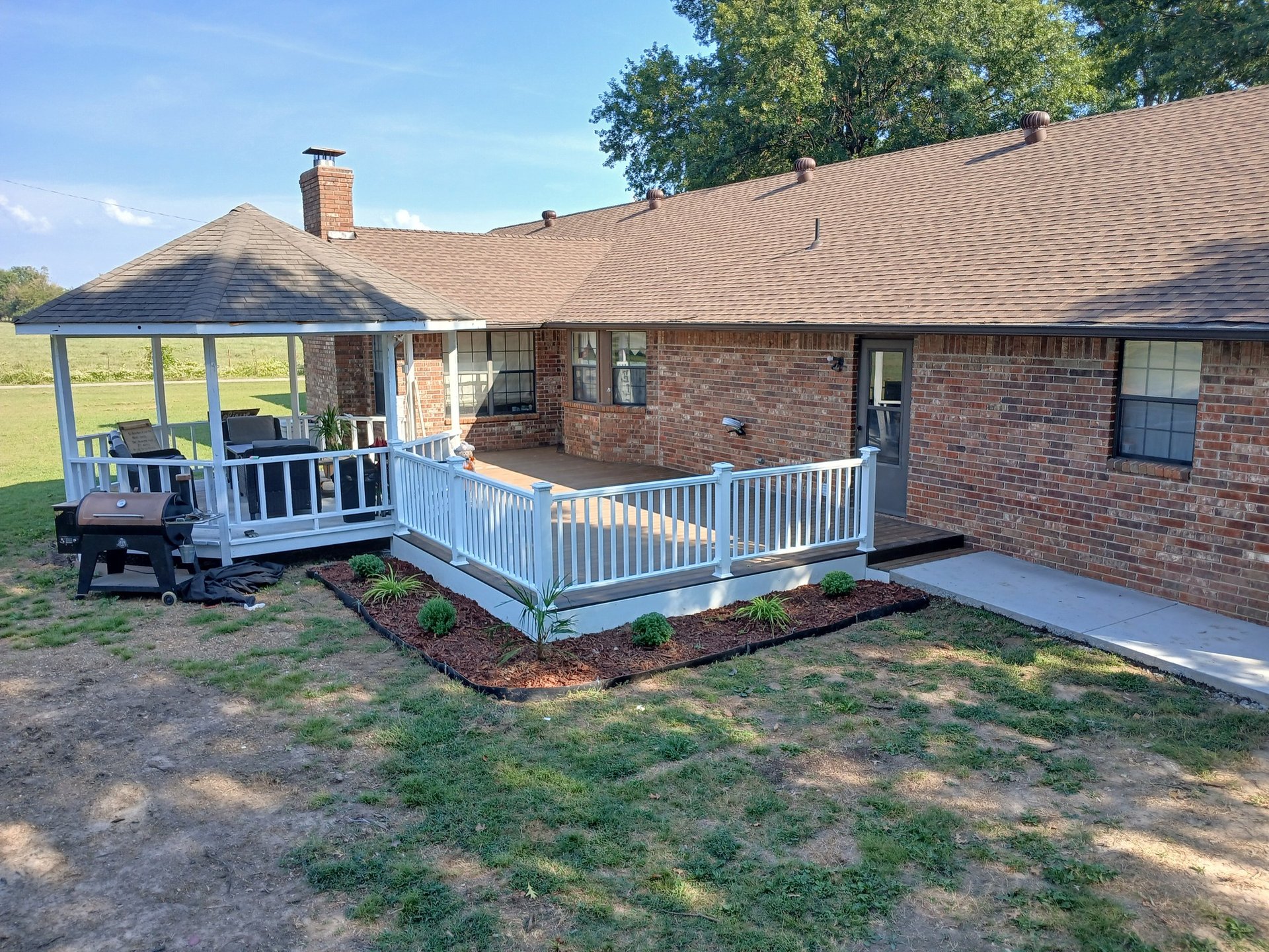 black and brown leather padded tub sofa