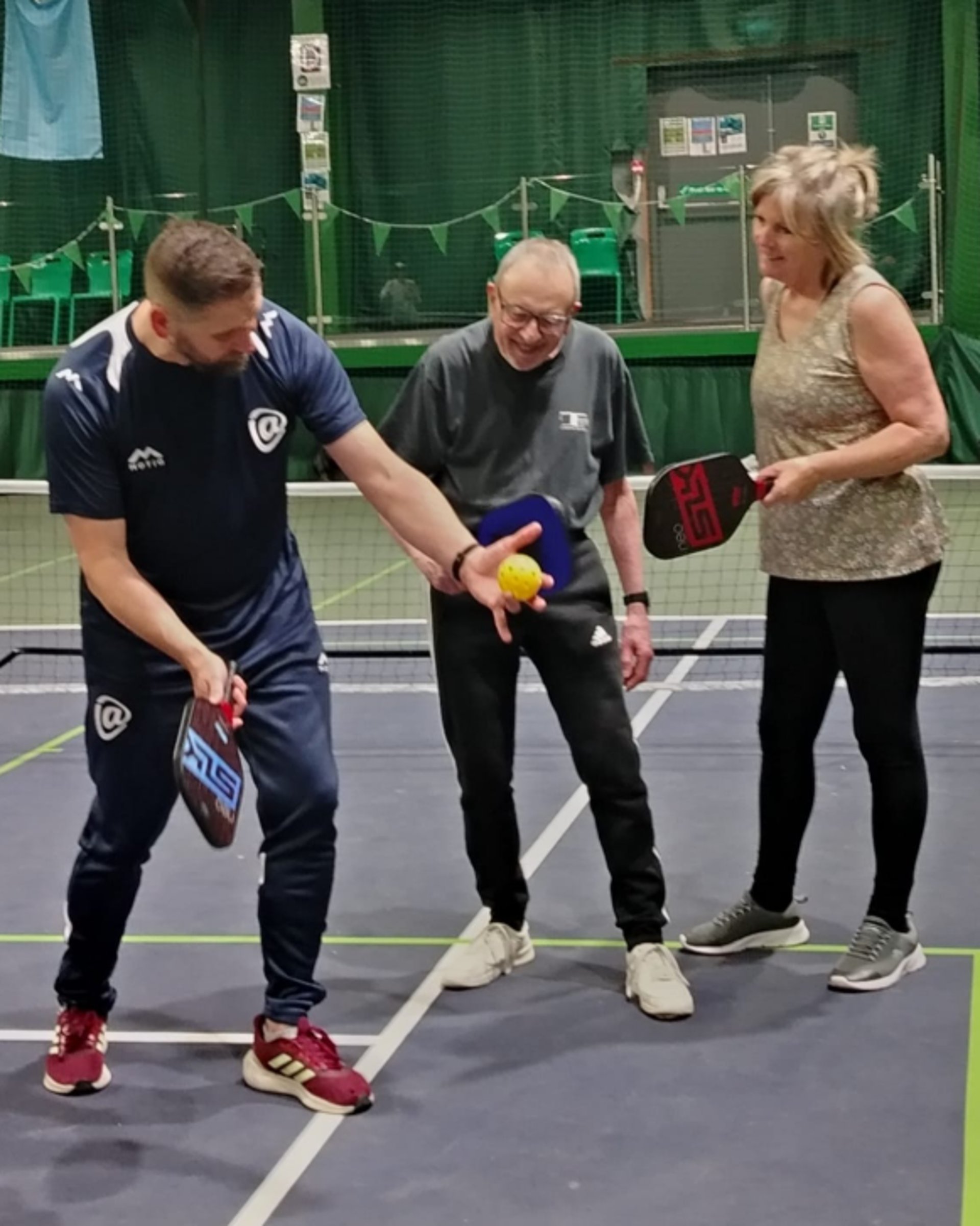 an abstract photo of a curved building with a blue sky in the background
