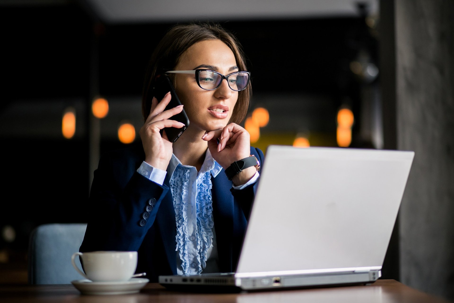 an abstract photo of a curved building with a blue sky in the background