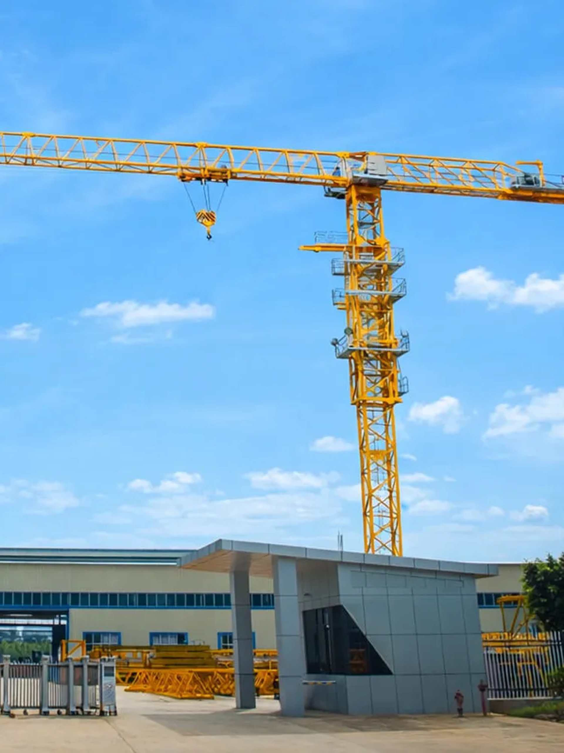 an abstract photo of a curved building with a blue sky in the background