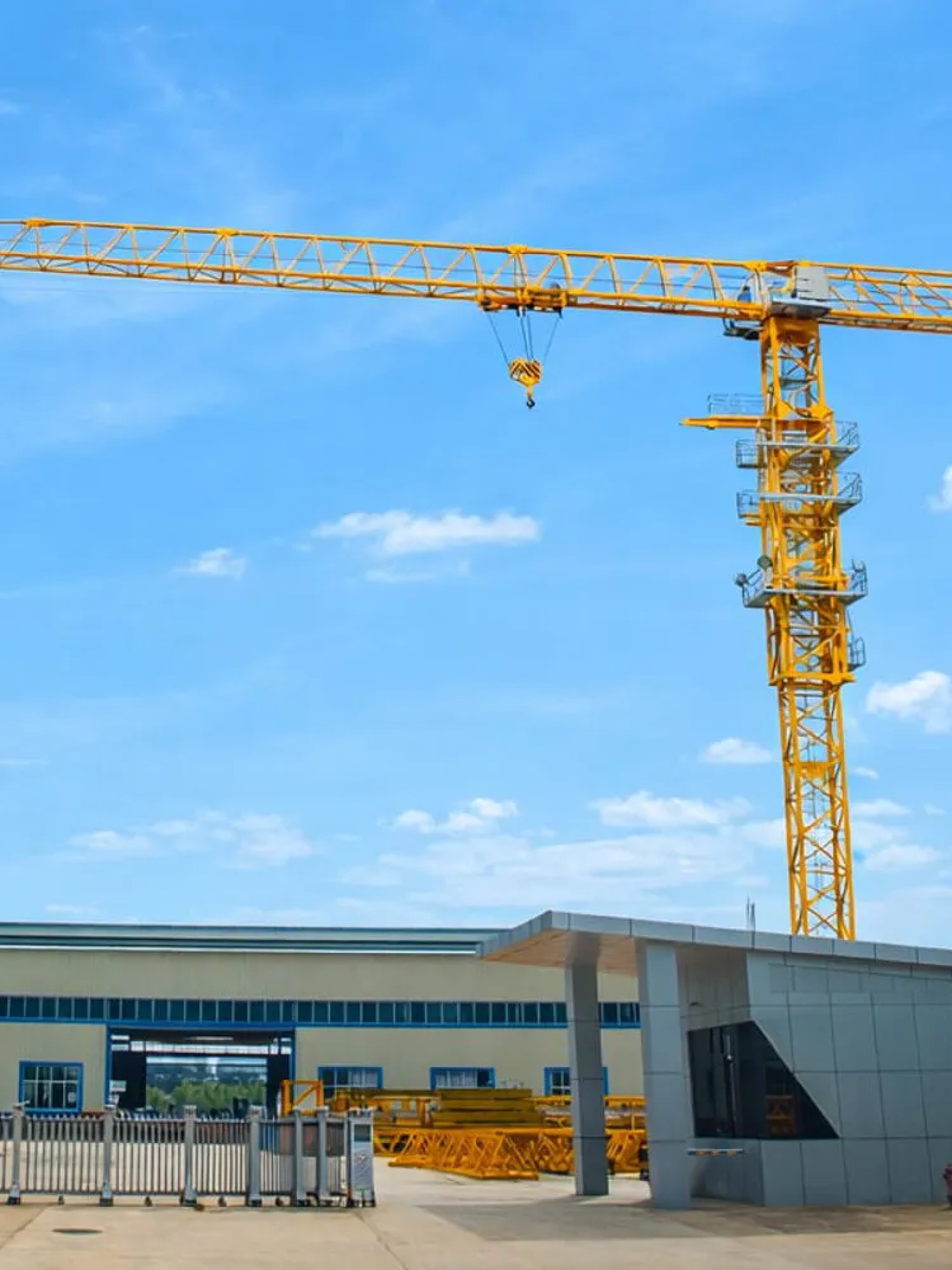 an abstract photo of a curved building with a blue sky in the background