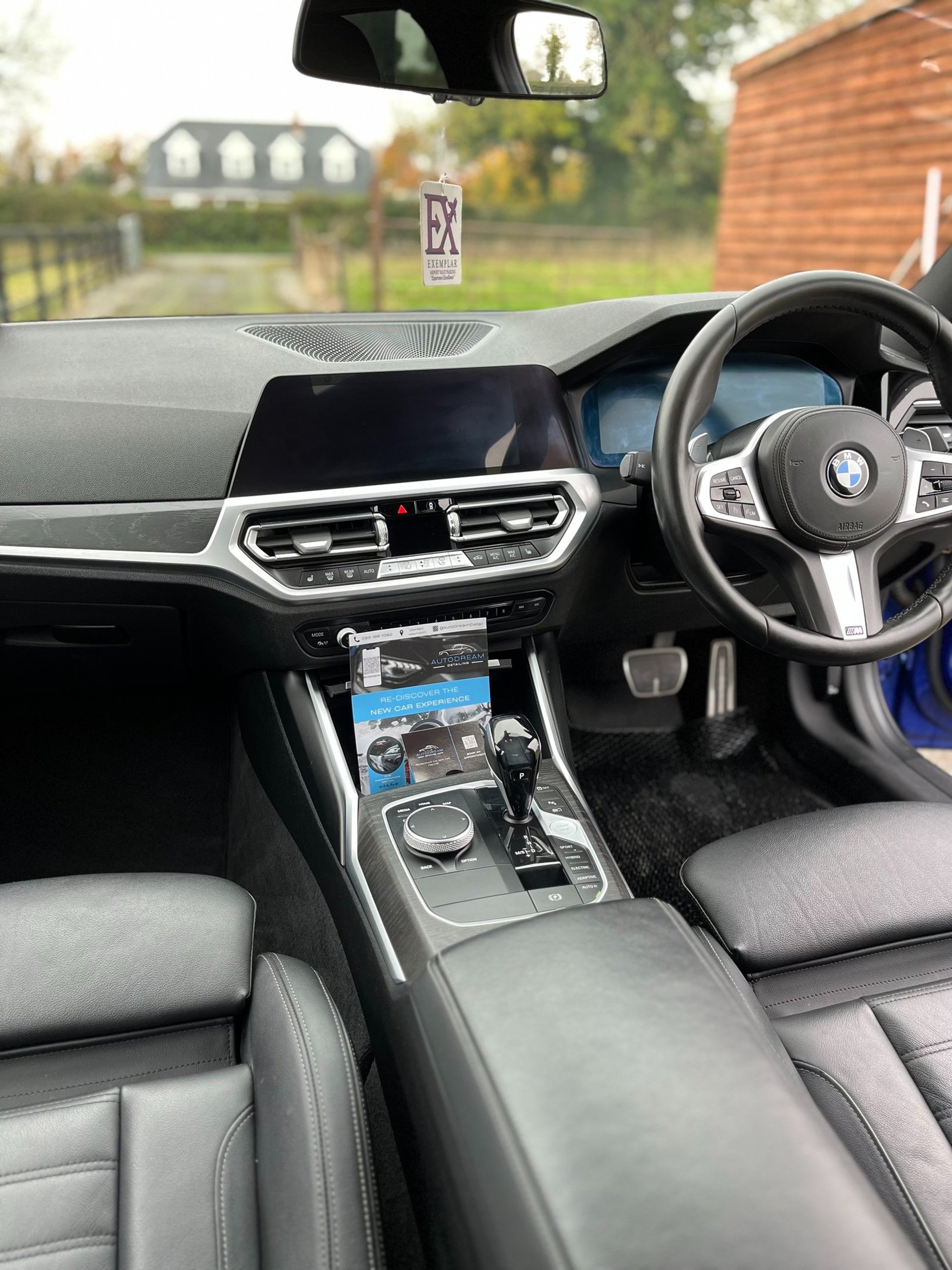 black and brown leather padded tub sofa