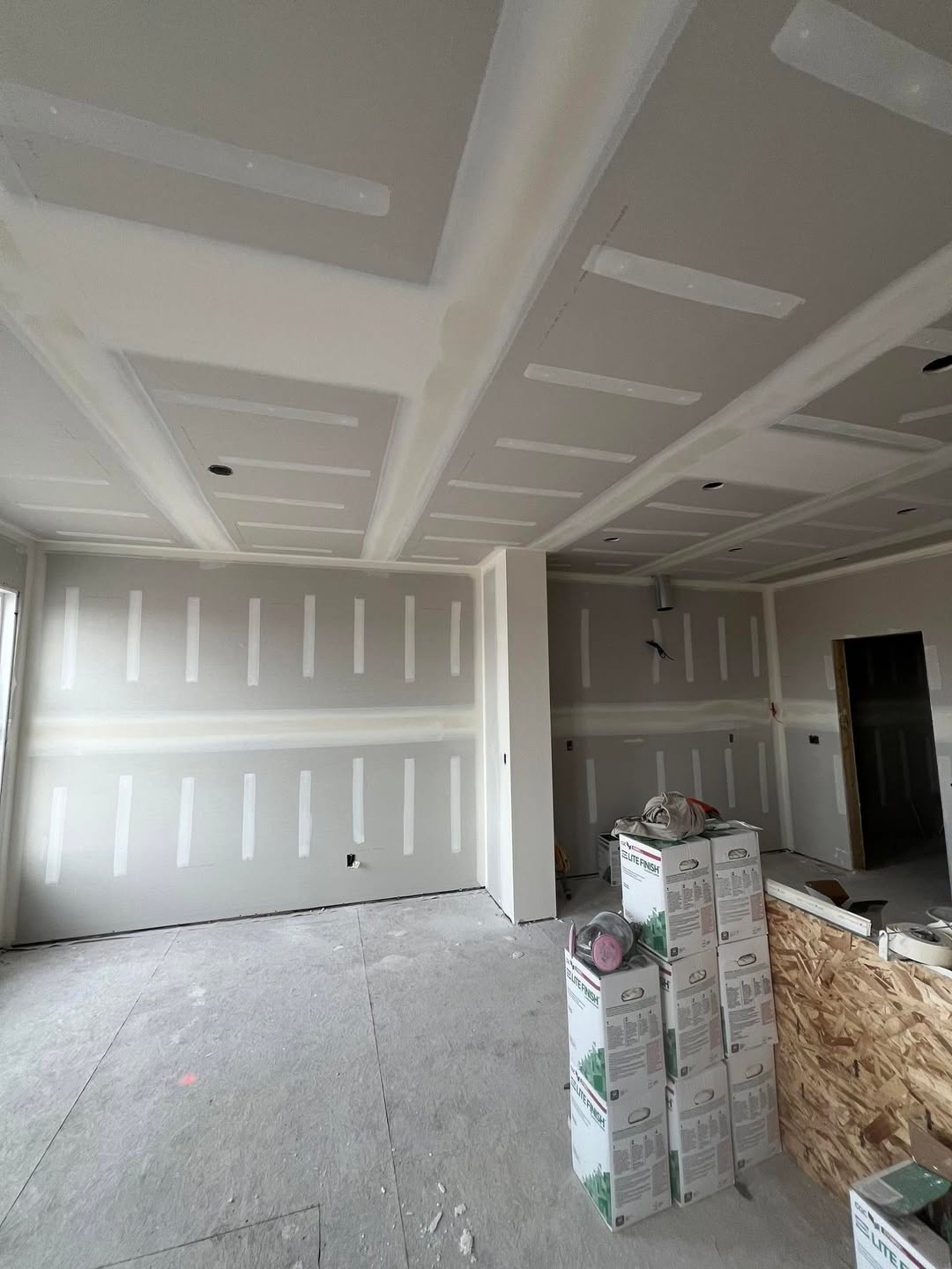 A large room with a lot of paint on the walls