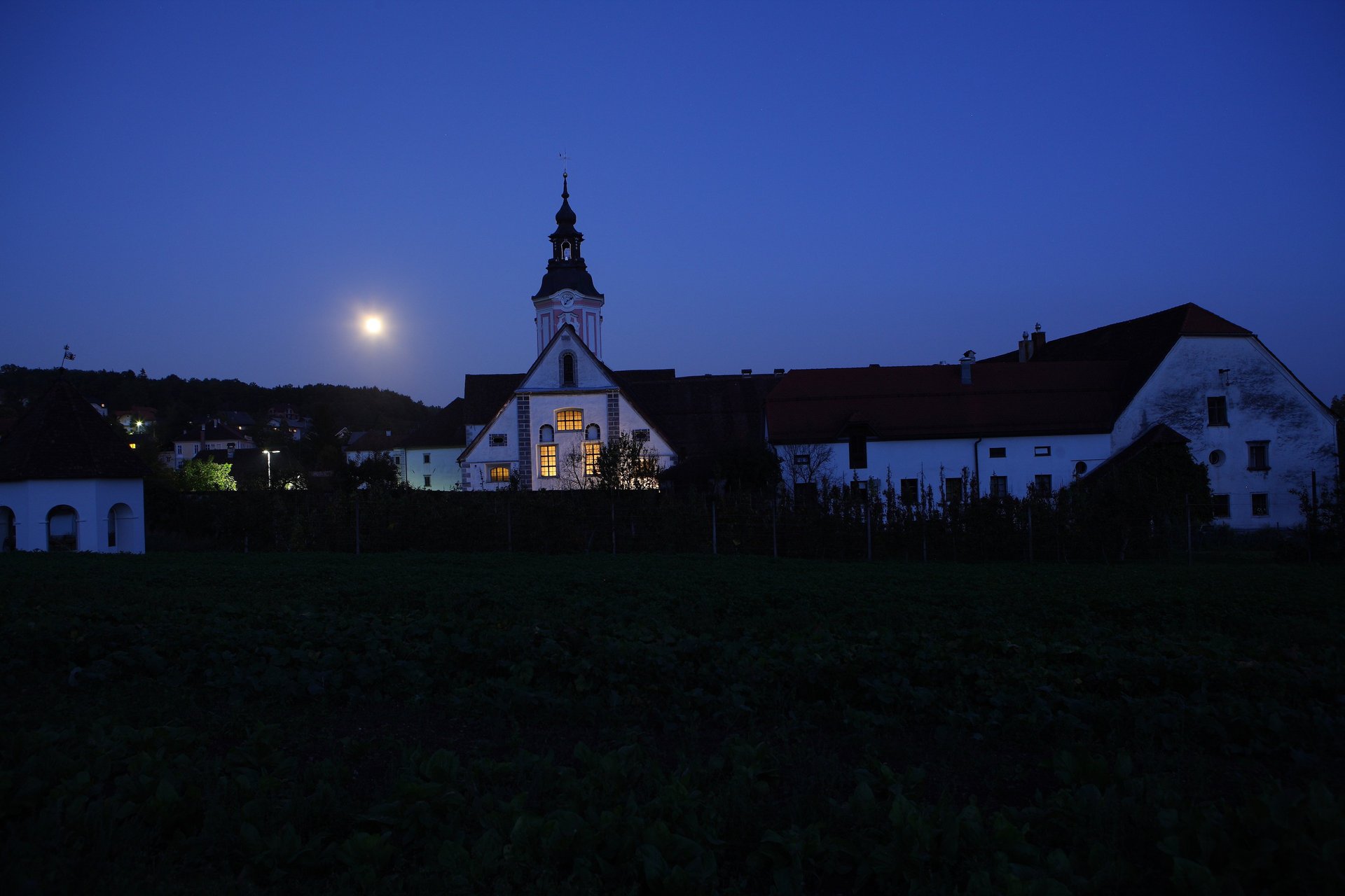 woman wearing yellow long-sleeved dress under white clouds and blue sky during daytime