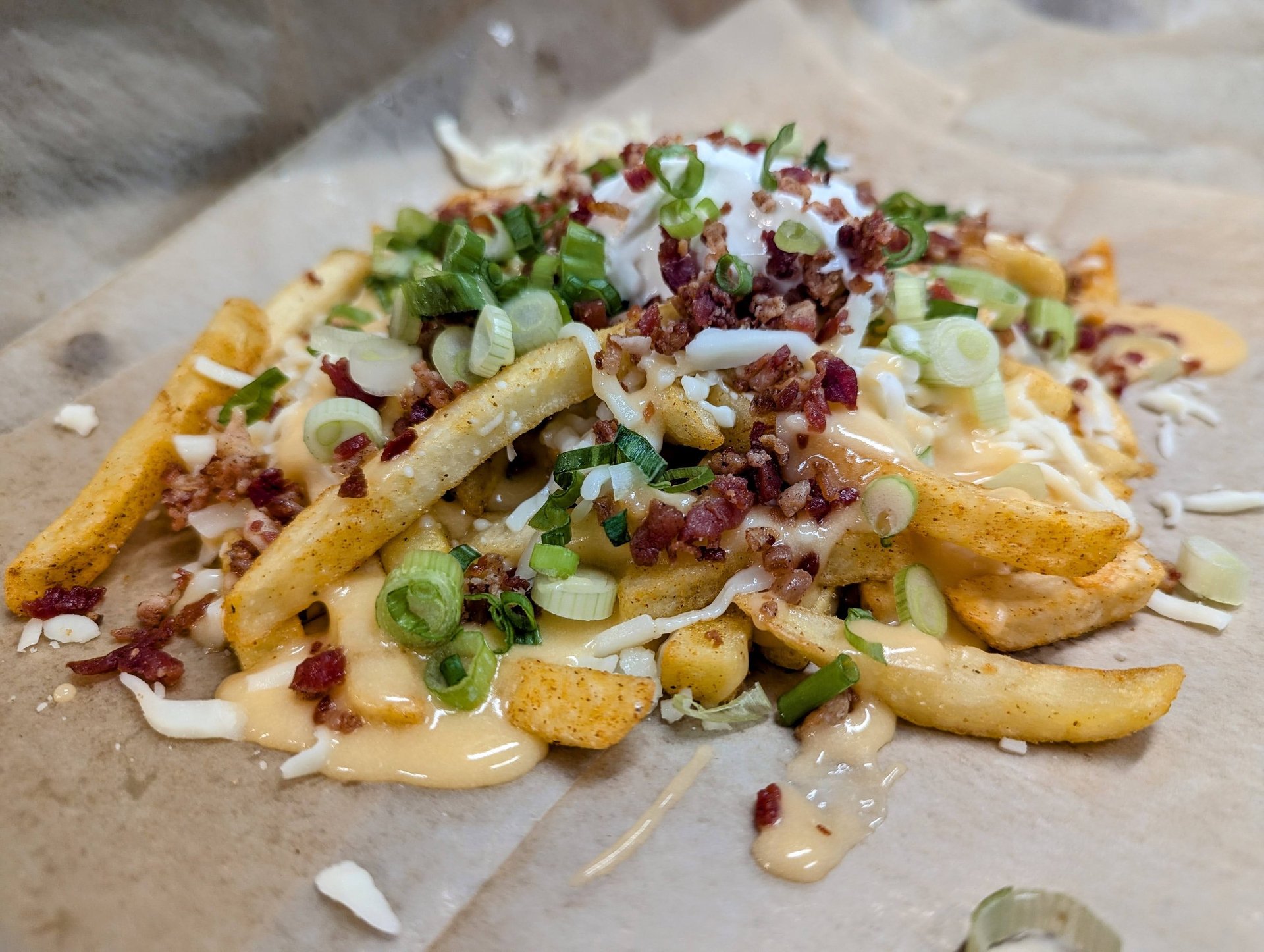 person wearing grey knit sweater