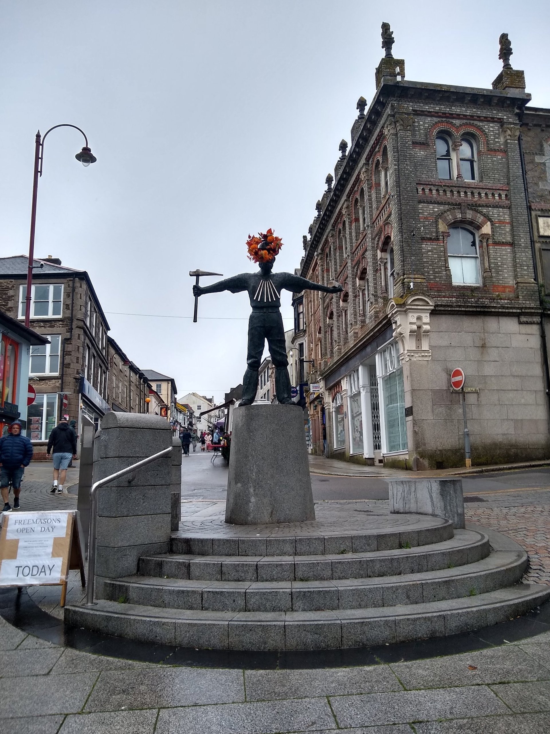 black and brown leather padded tub sofa