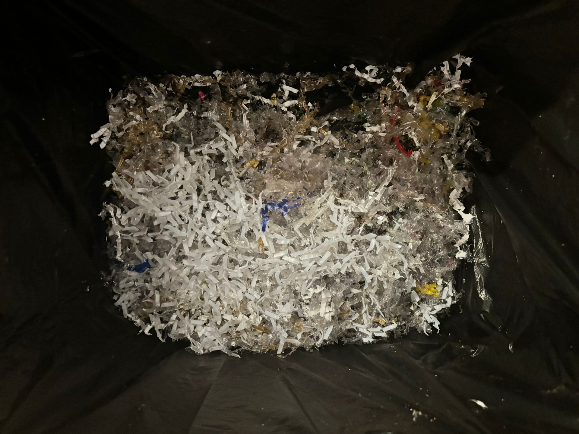 an abstract photo of a curved building with a blue sky in the background