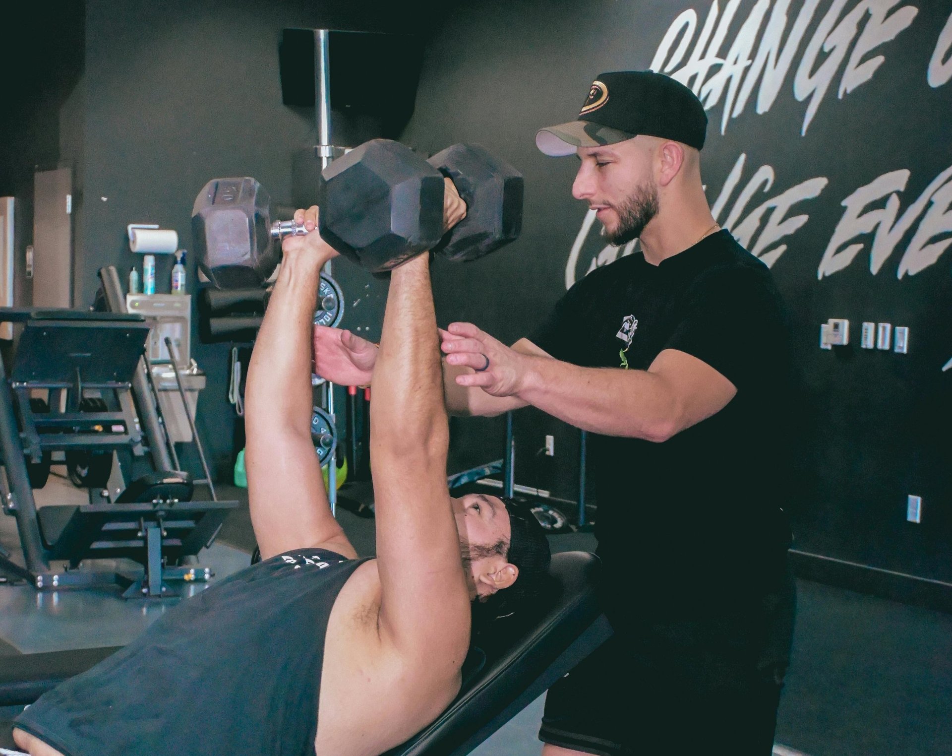 an abstract photo of a curved building with a blue sky in the background