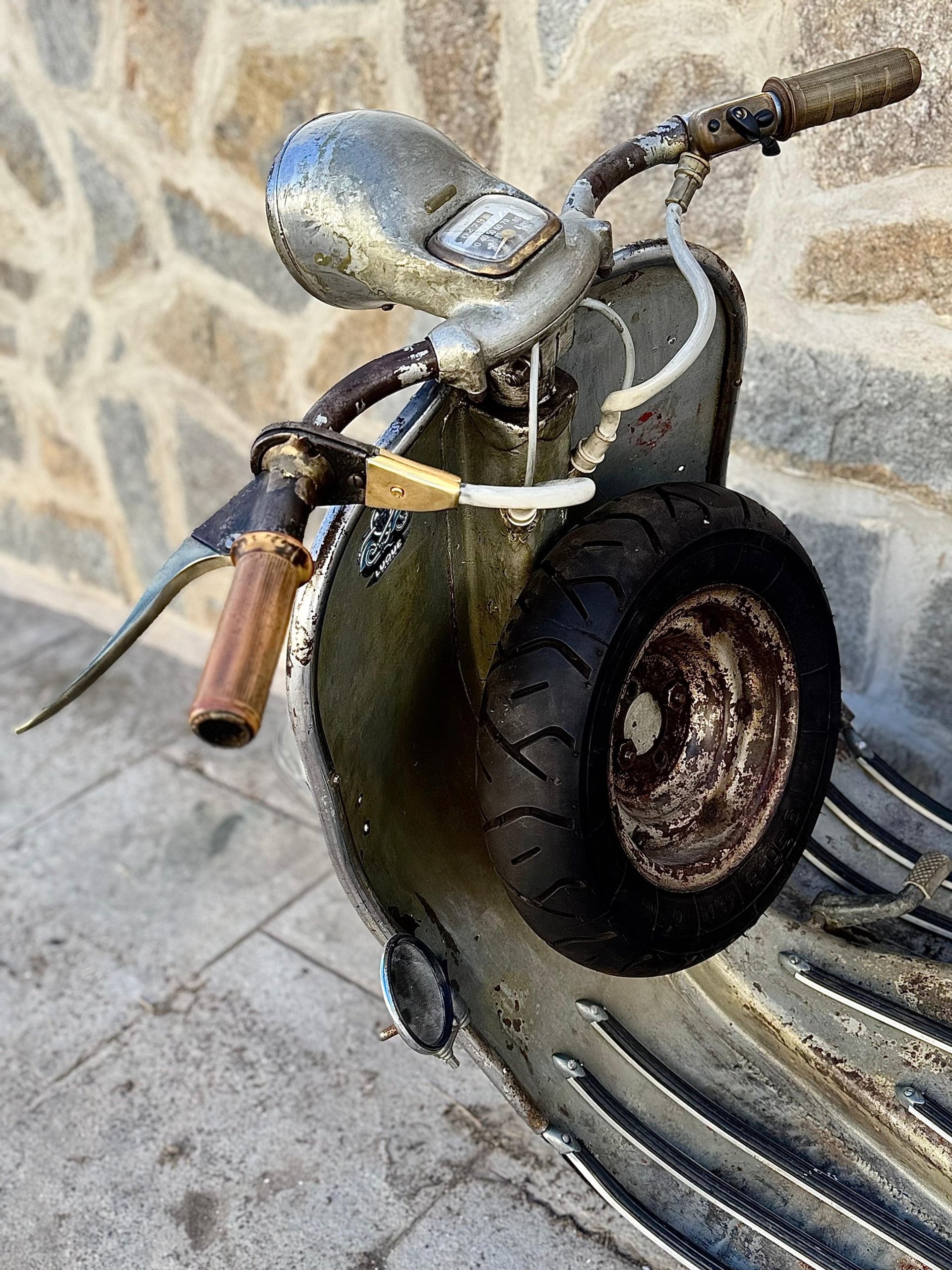 person wearing grey knit sweater