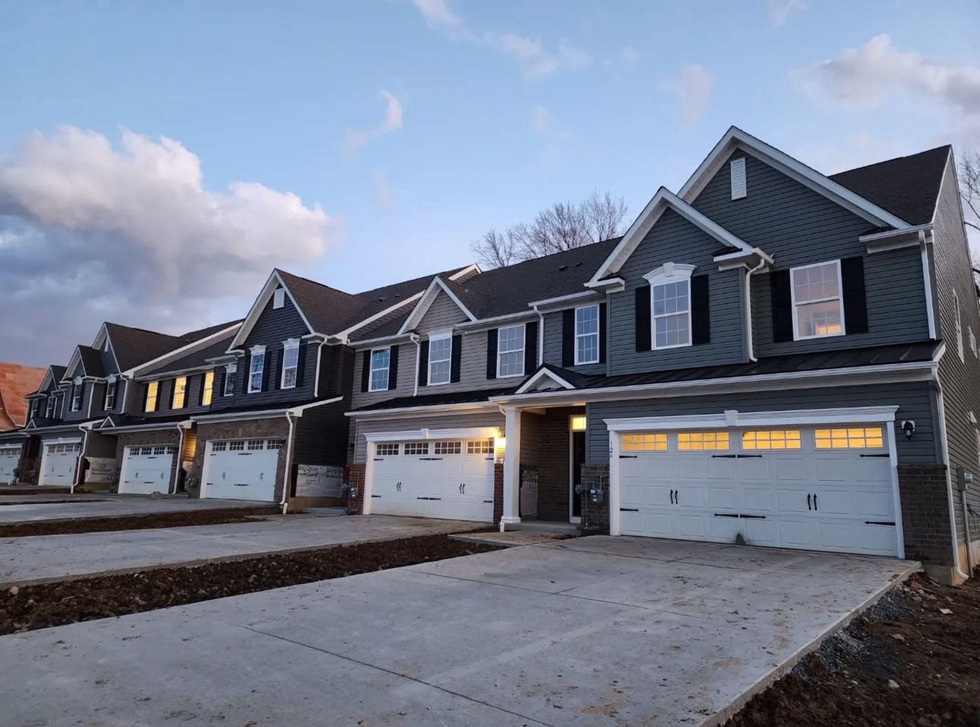 an abstract photo of a curved building with a blue sky in the background