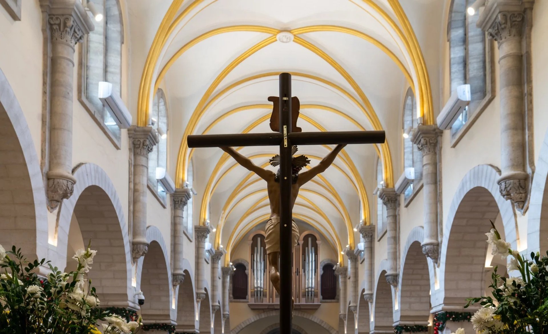 a large cathedral with stained glass windows inside of it