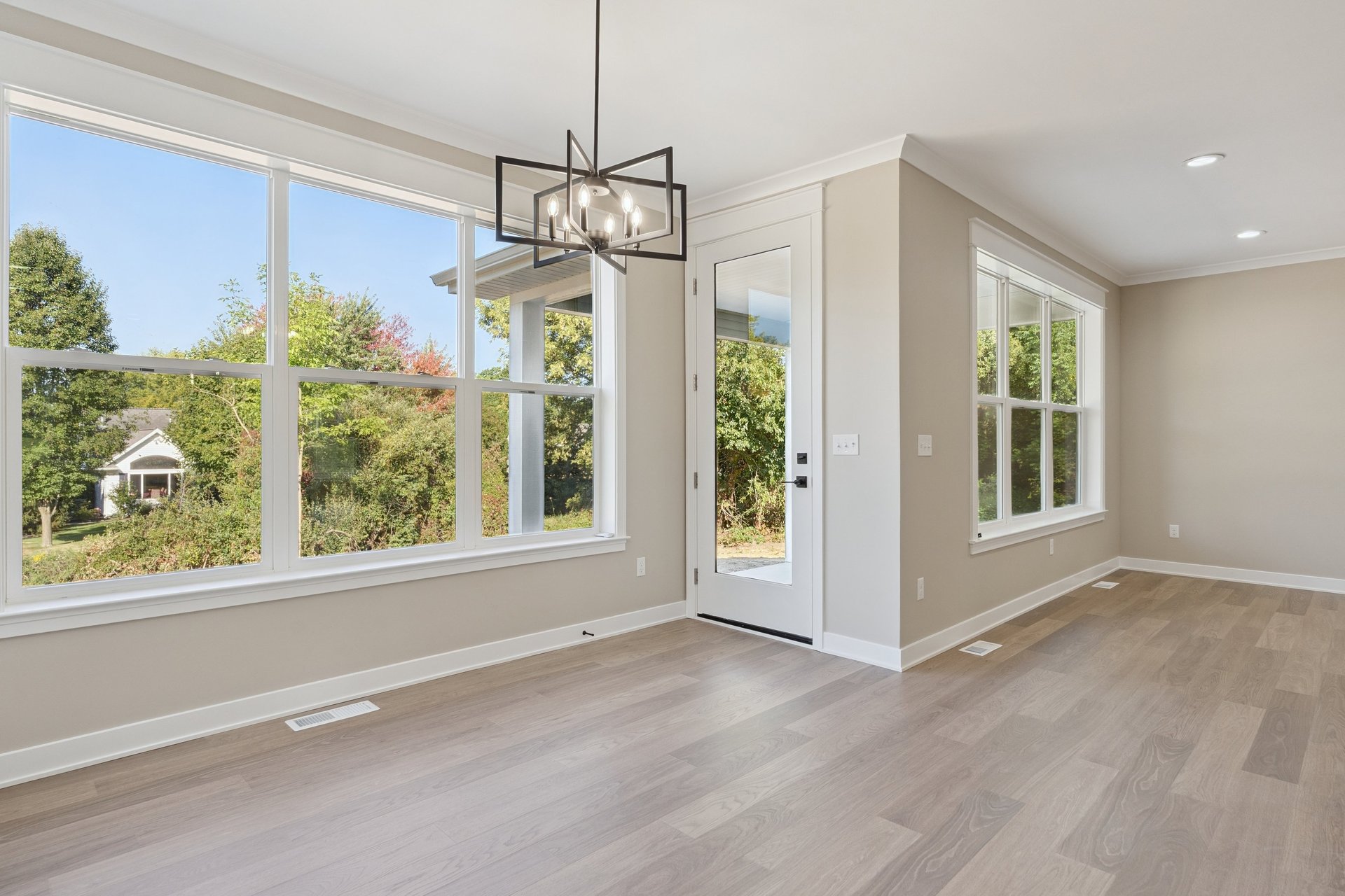 a blanket on a table next to a potted plant