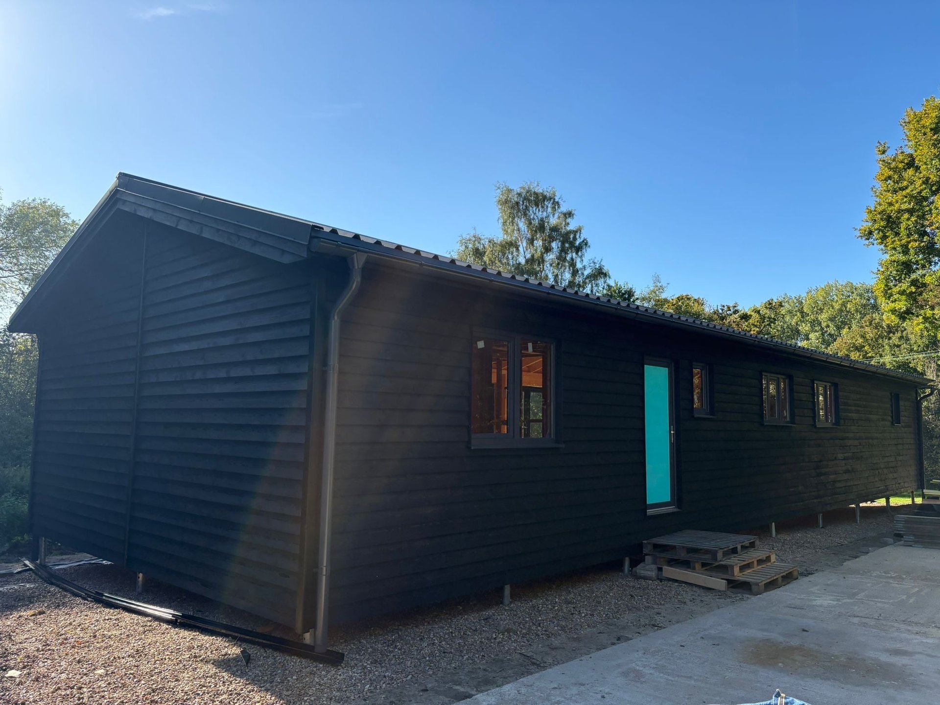 black and brown leather padded tub sofa