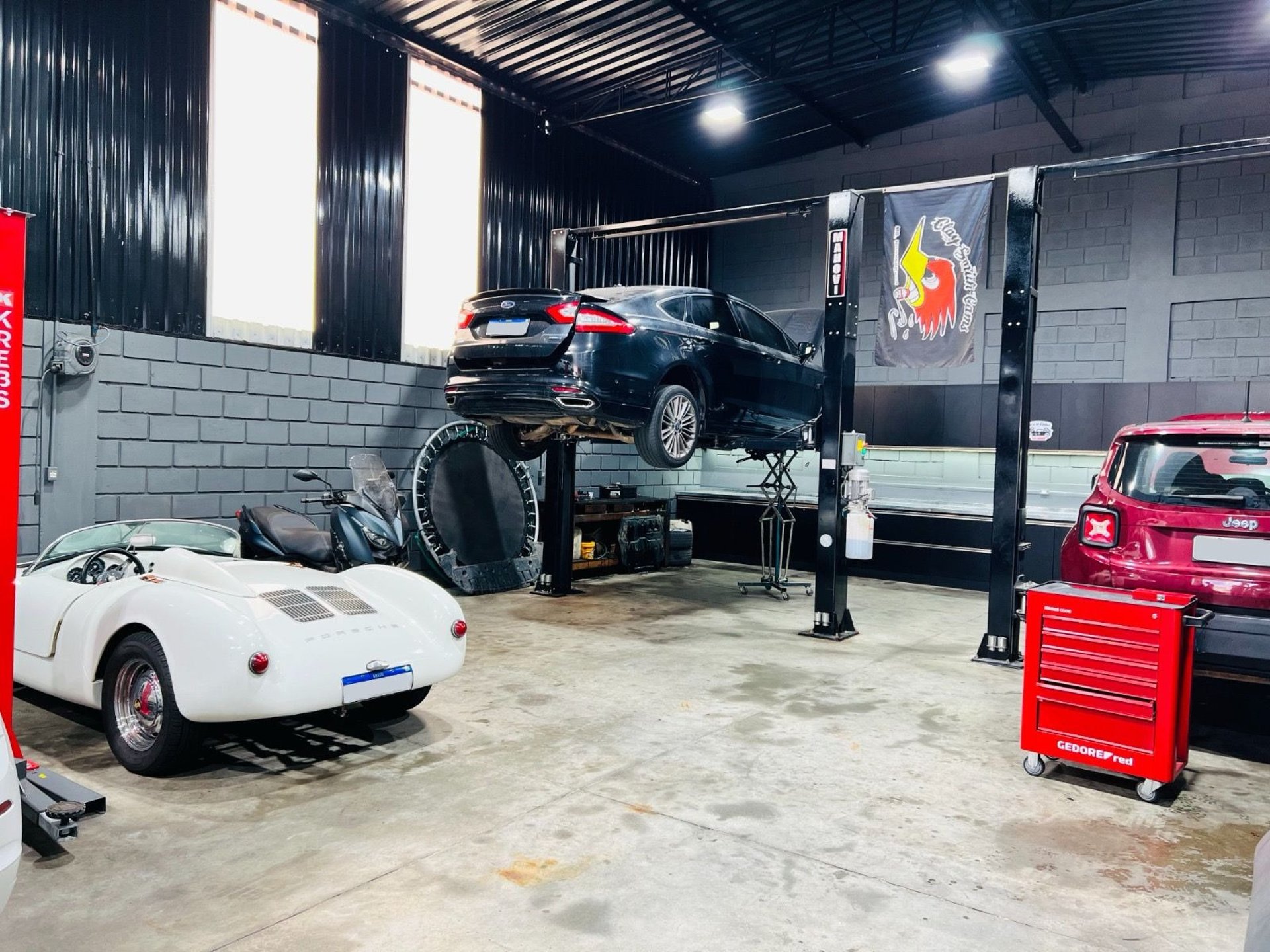 black and brown leather padded tub sofa
