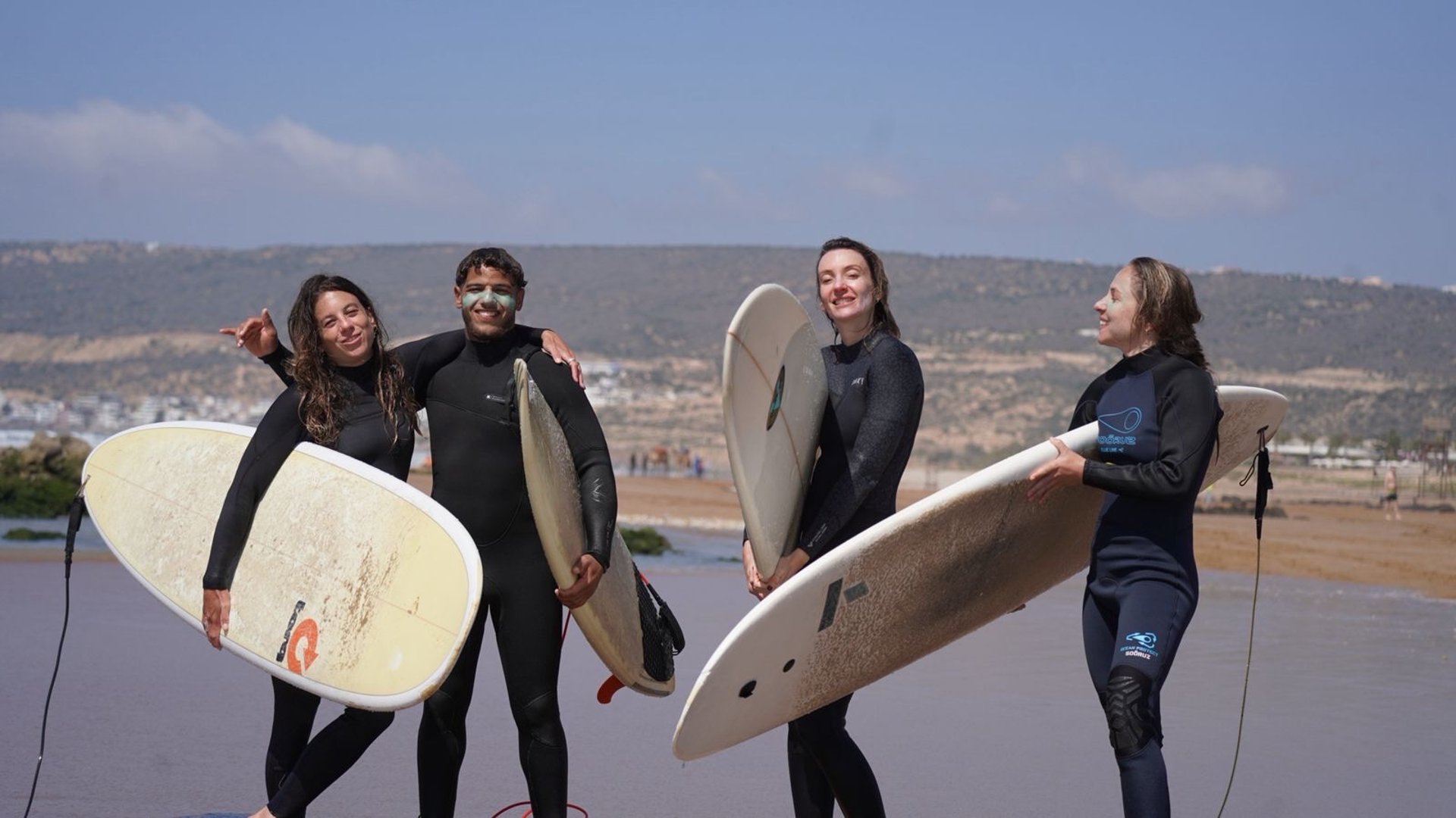an abstract photo of a curved building with a blue sky in the background