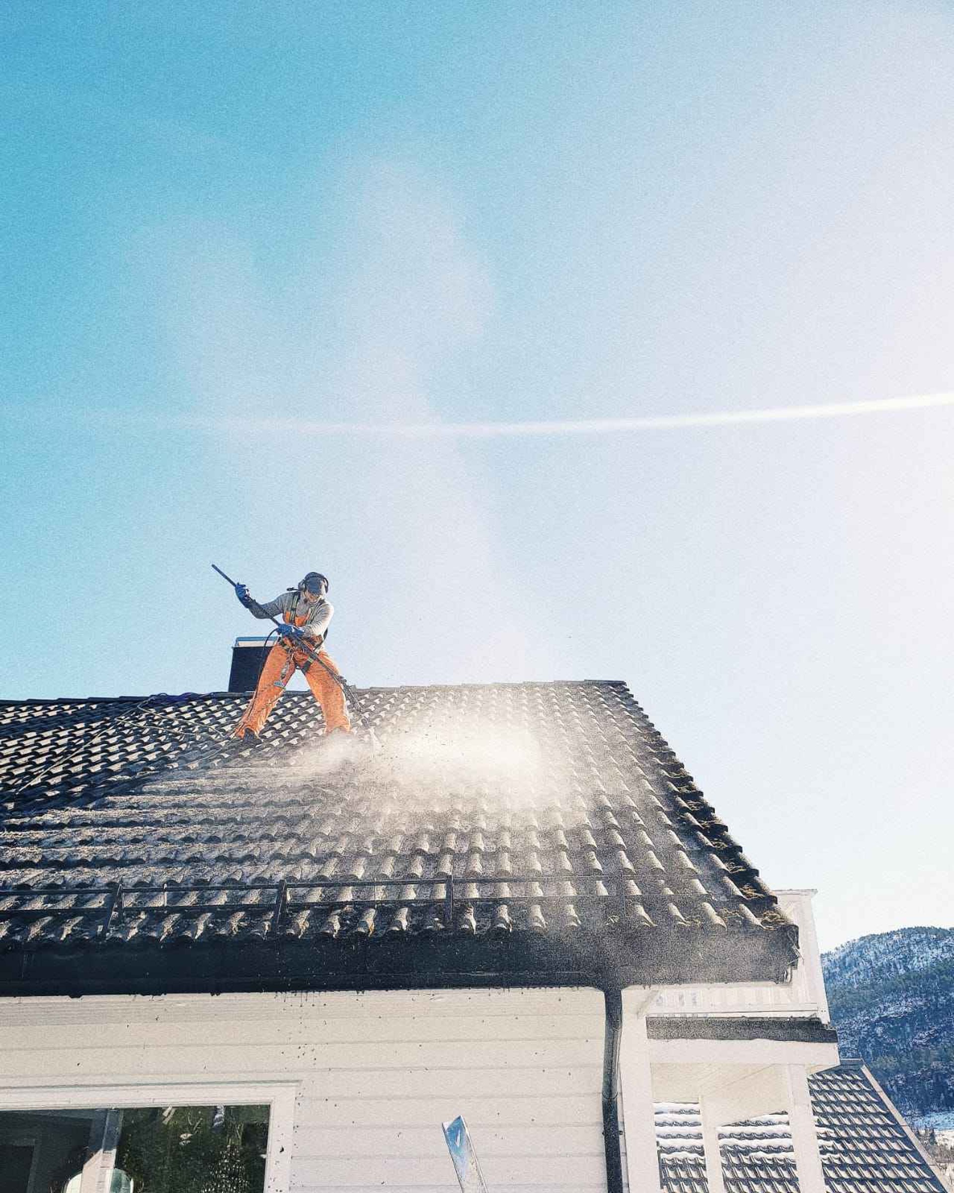 black and brown leather padded tub sofa