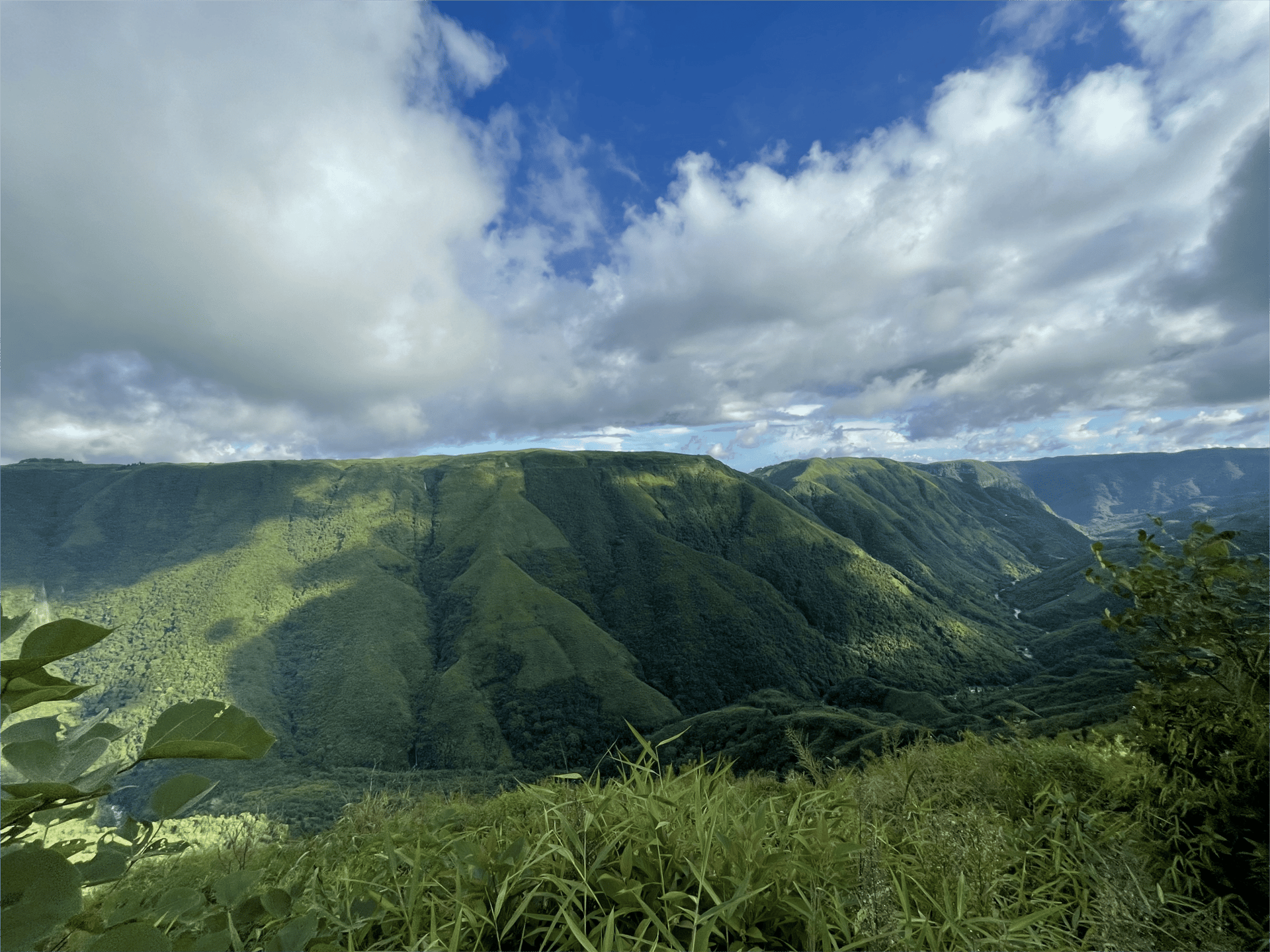 three brown wooden boat on blue lake water taken at daytime