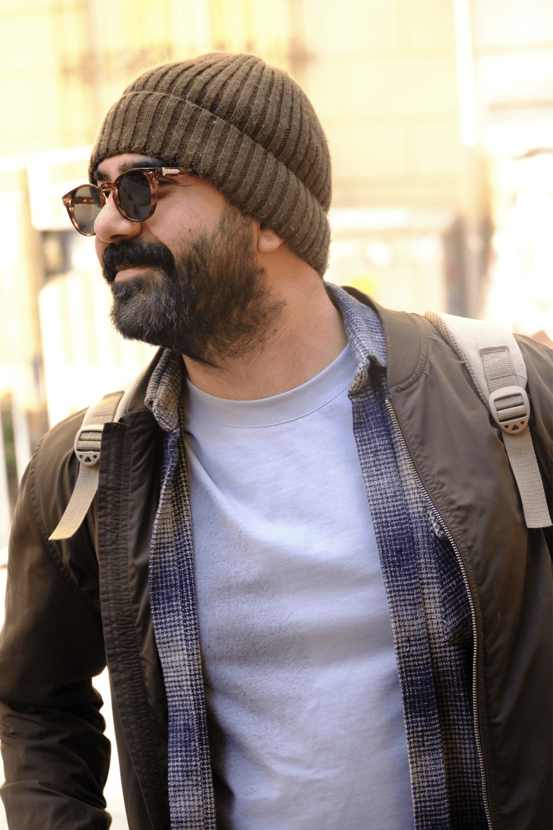 person wearing grey knit sweater