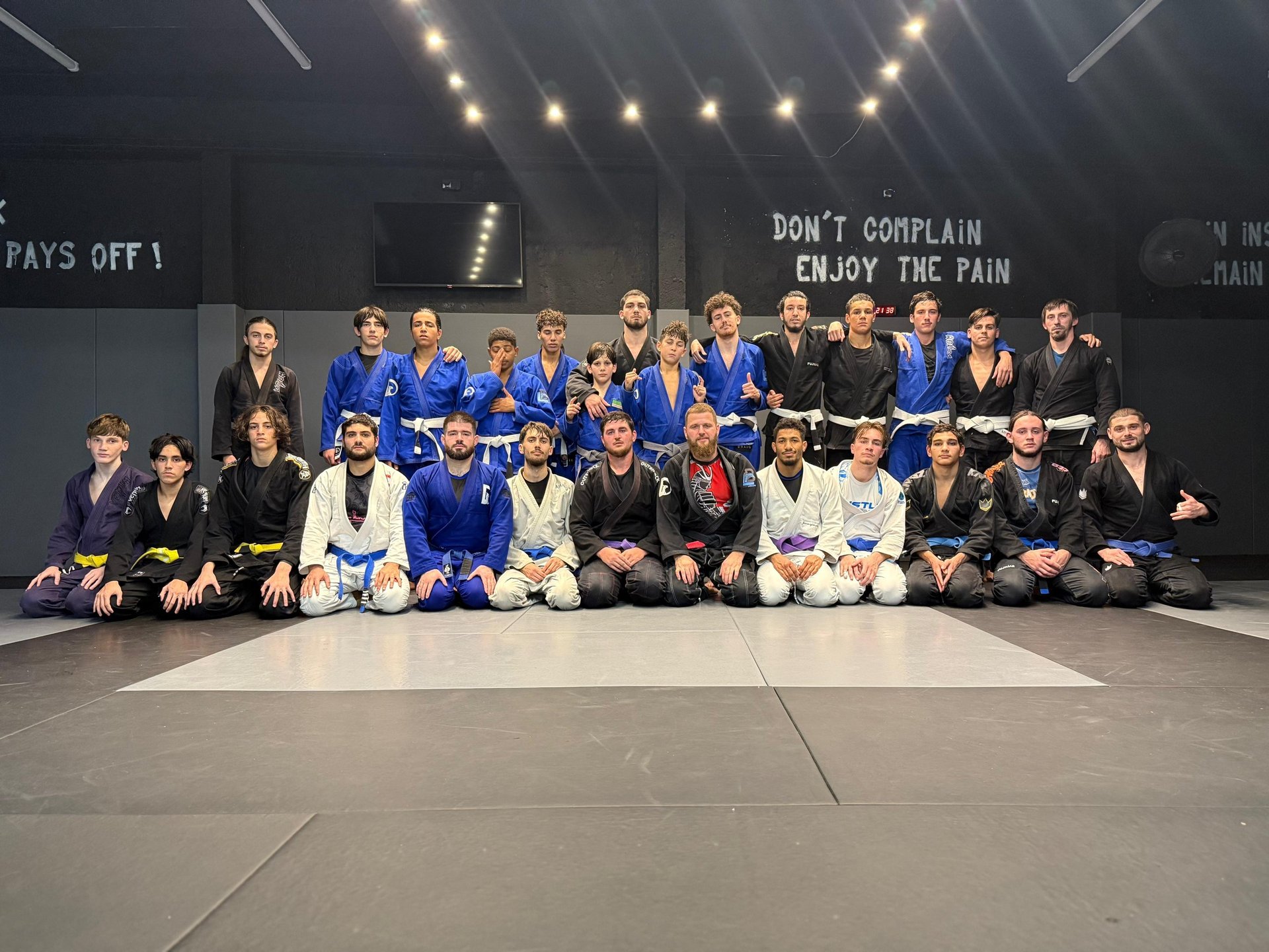 black and brown leather padded tub sofa