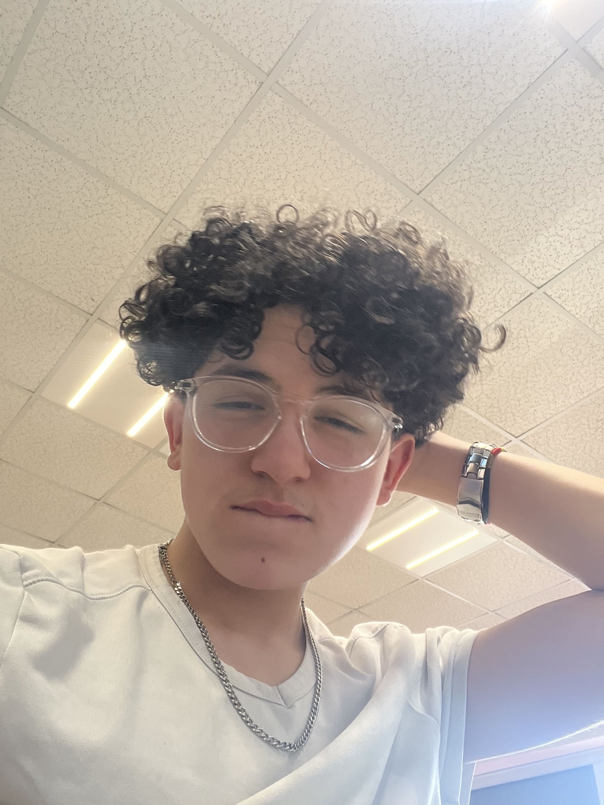 person wearing grey knit sweater