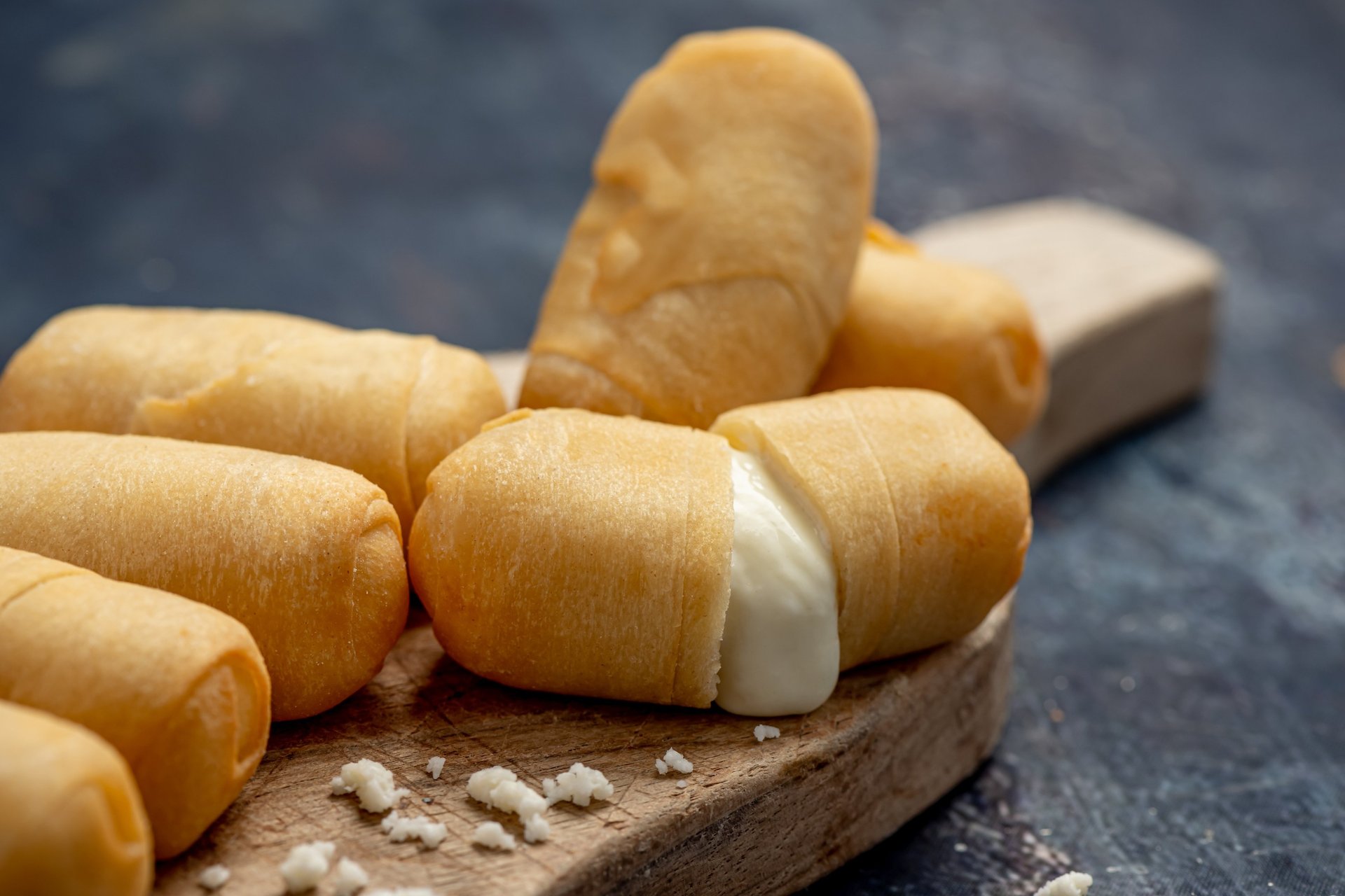 an abstract photo of a curved building with a blue sky in the background