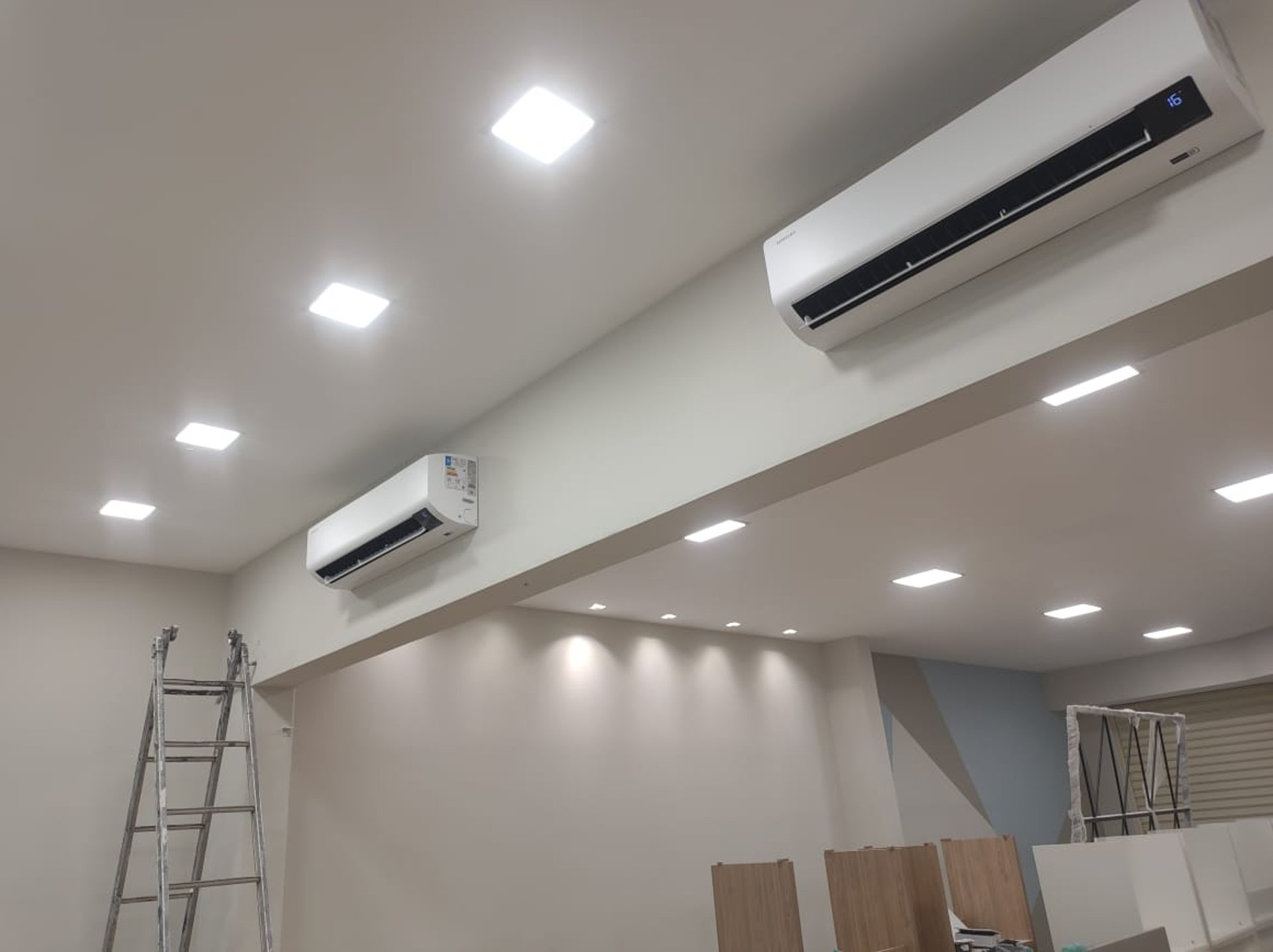 black and brown leather padded tub sofa