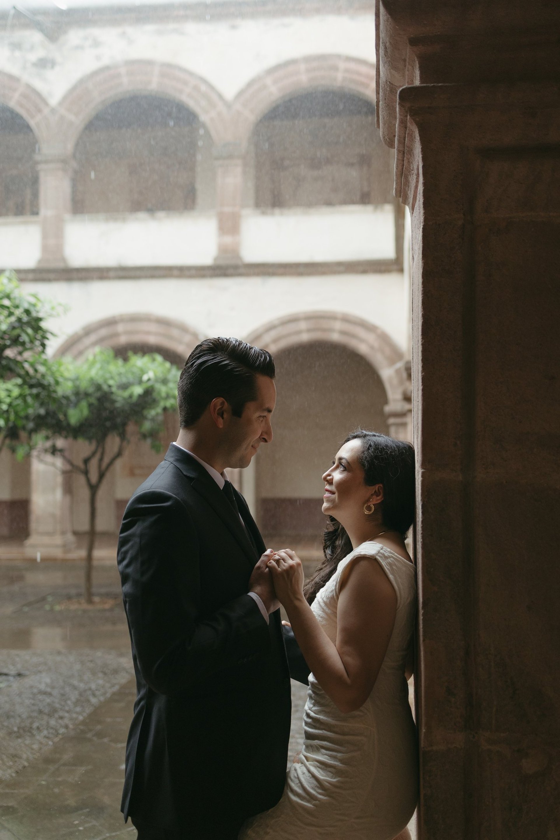 couple wearing silver-colored rings
