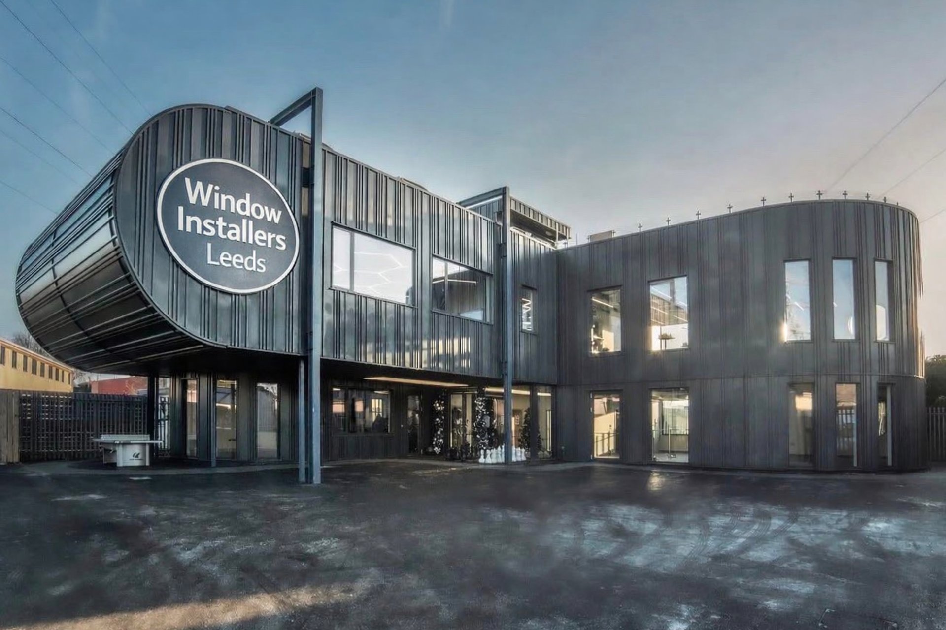 black and brown leather padded tub sofa