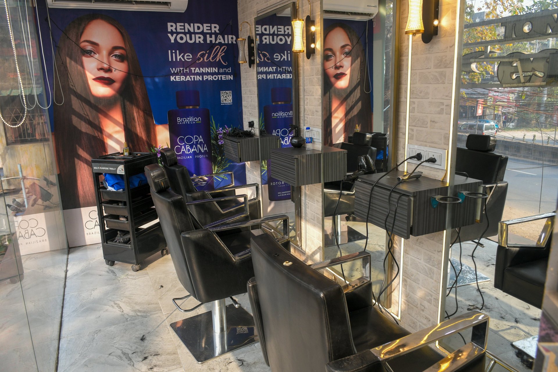 a woman getting her nails done at a nail salon
