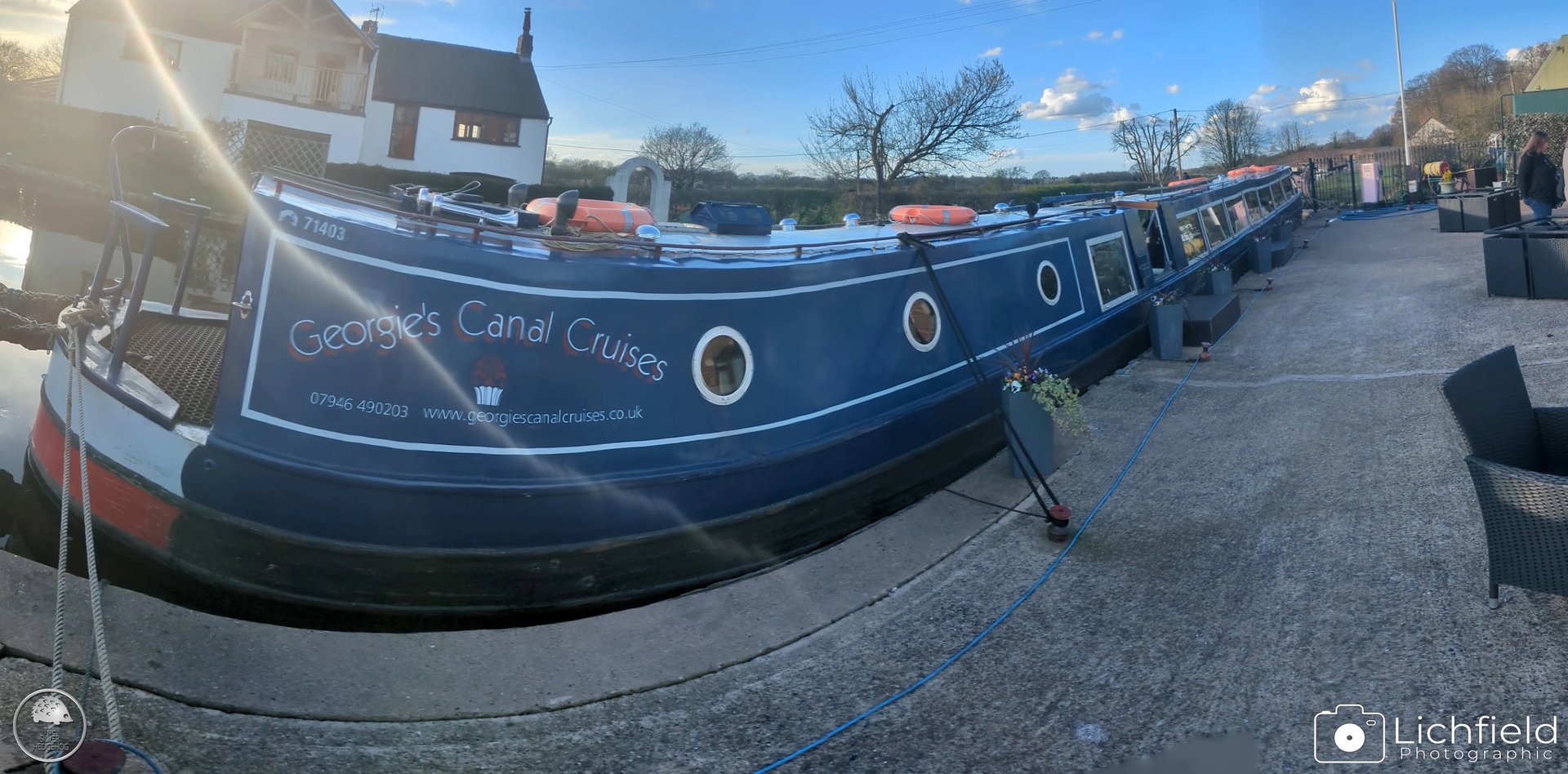Blue Canal Boat docked