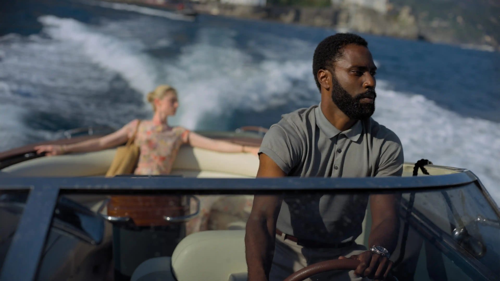 Cast image of Tenet on a boat