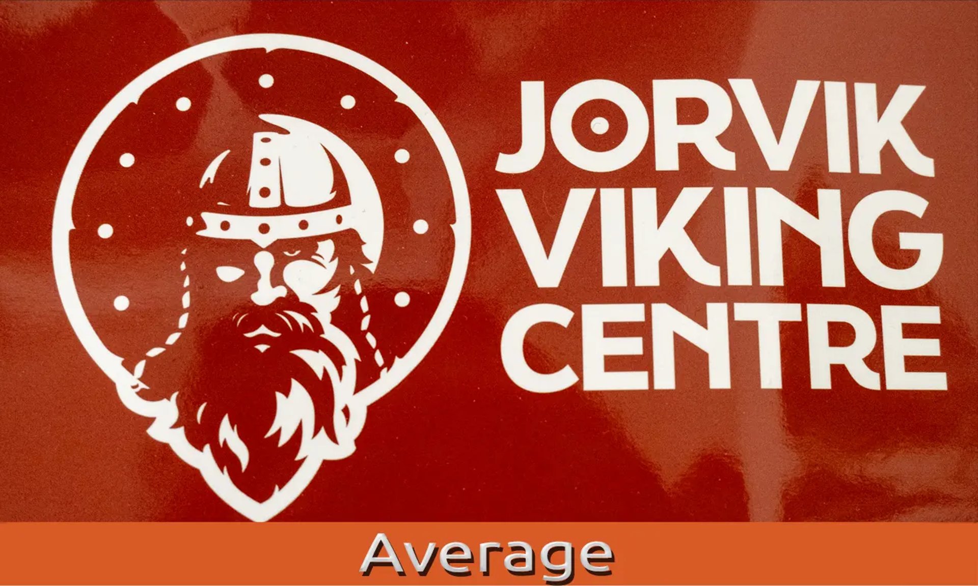 An image showing Jorvik Viking Centre white text on red background