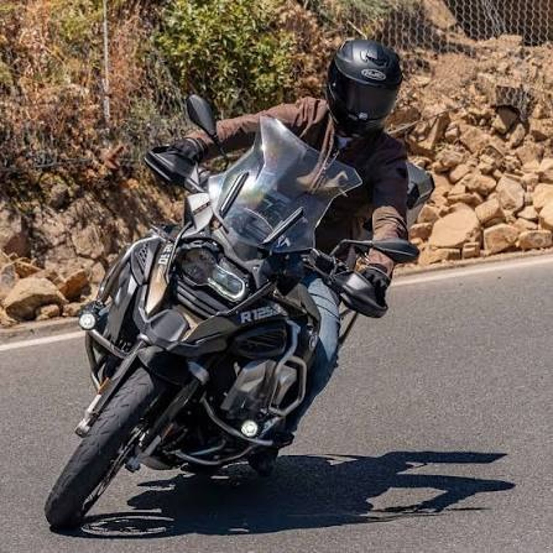 black and silver cruiser motorcycle on road during daytime