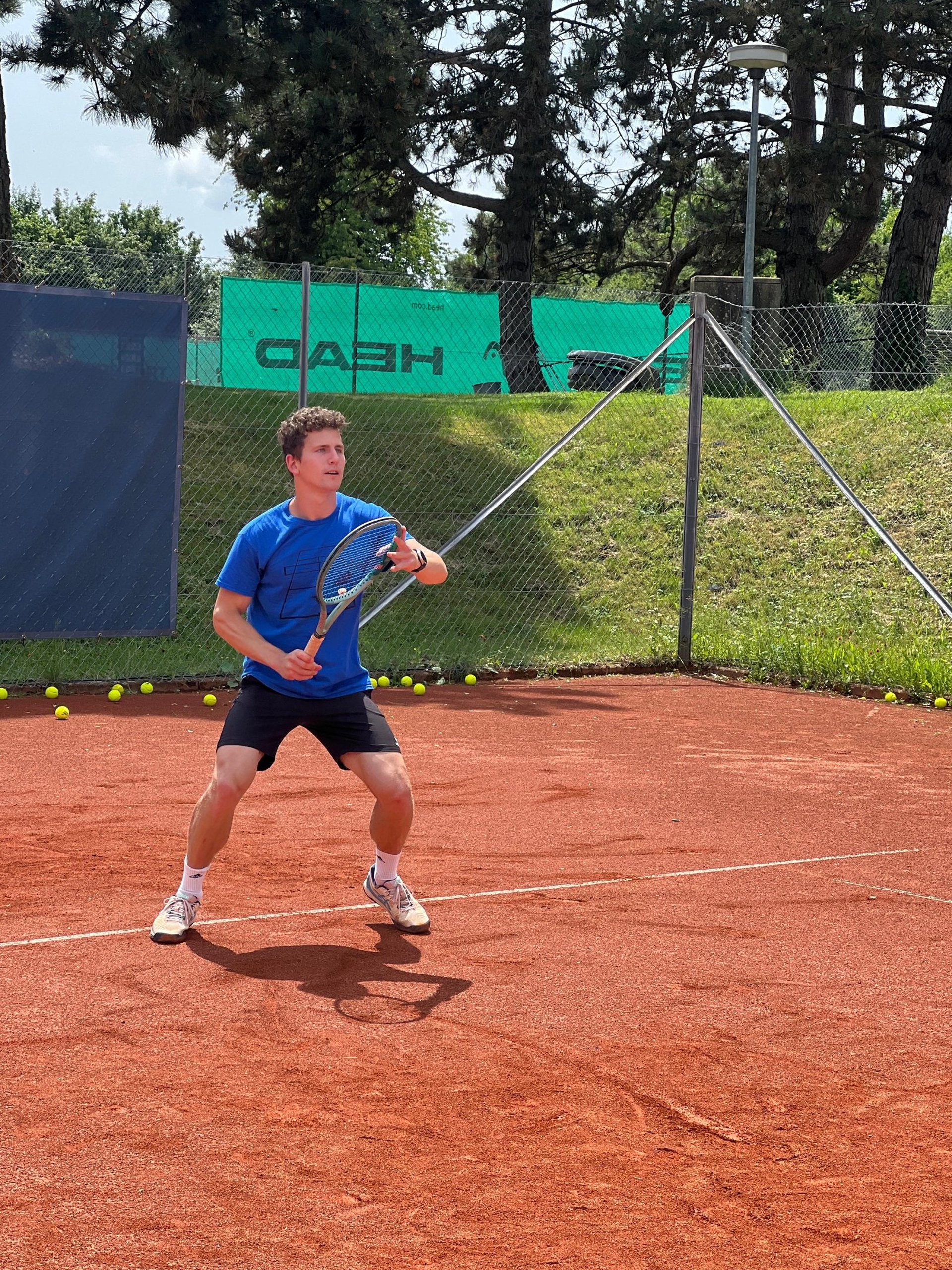 woman in black tank top and black leggings doing yoga