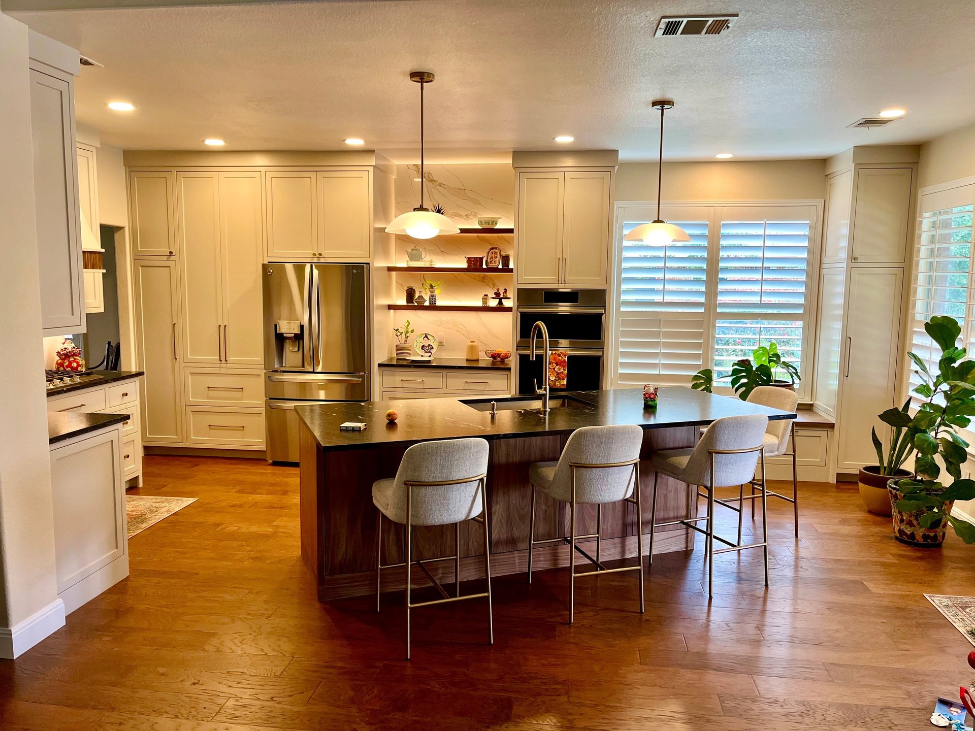 black and brown leather padded tub sofa