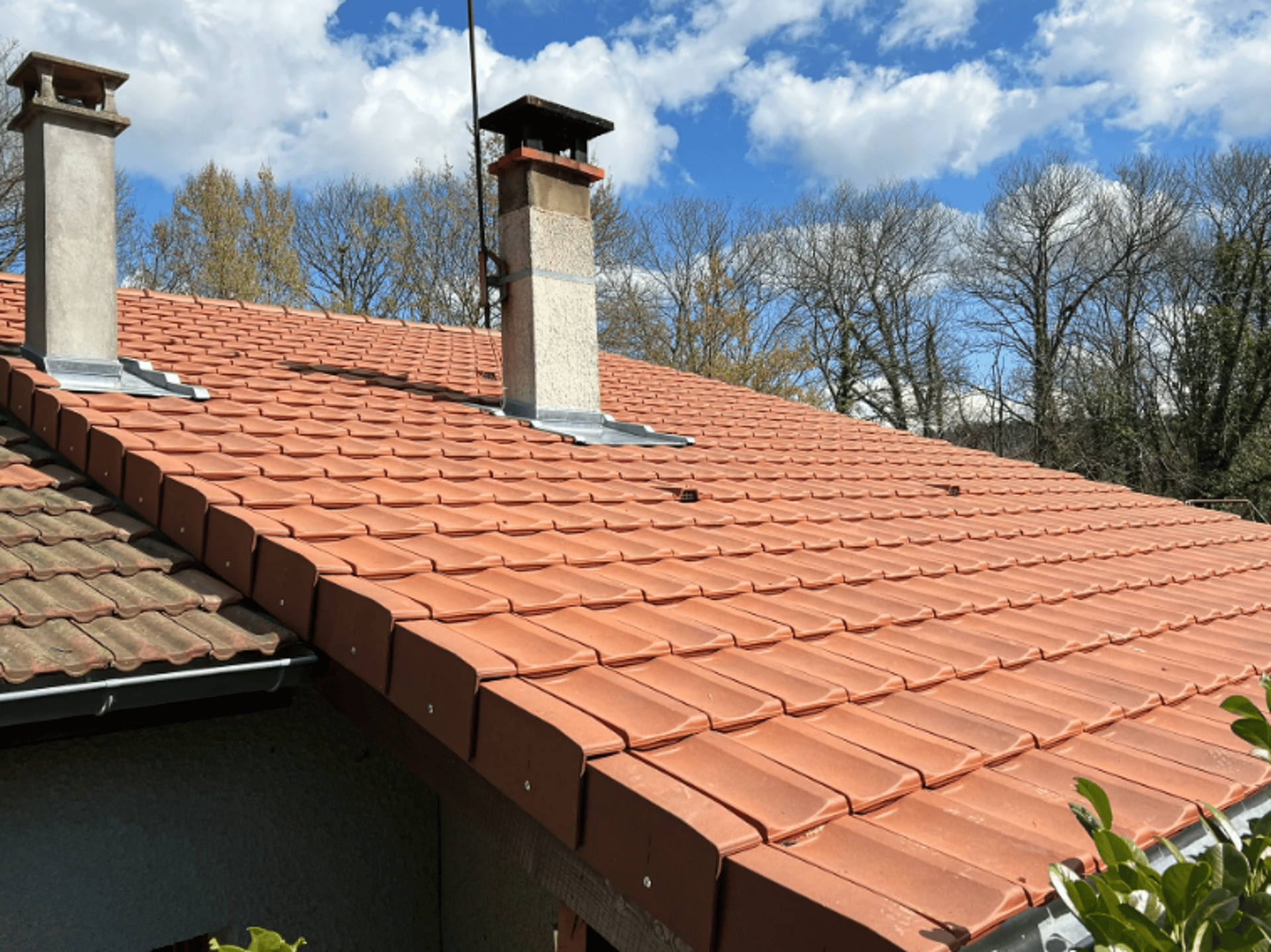 an abstract photo of a curved building with a blue sky in the background