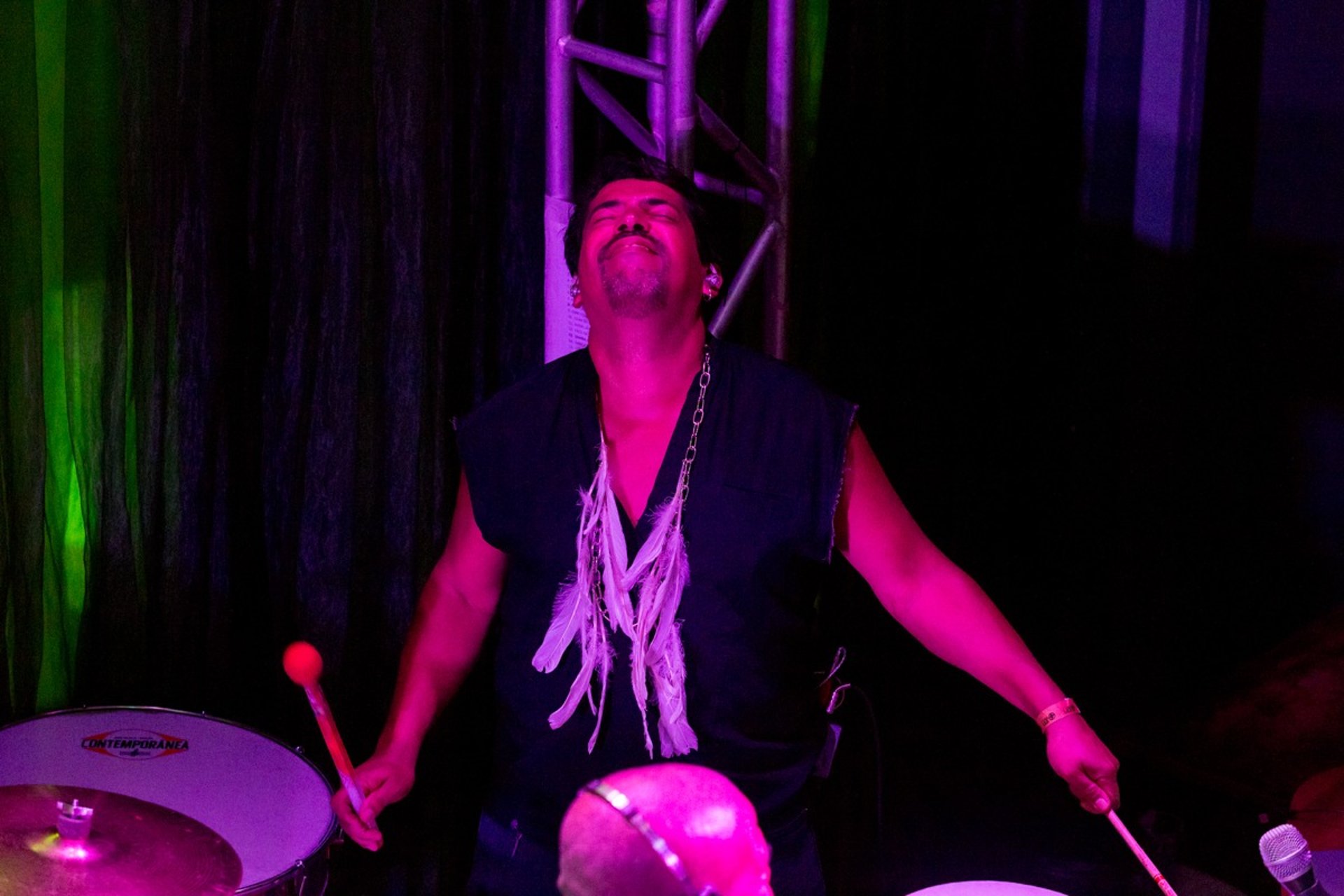woman wearing yellow long-sleeved dress under white clouds and blue sky during daytime