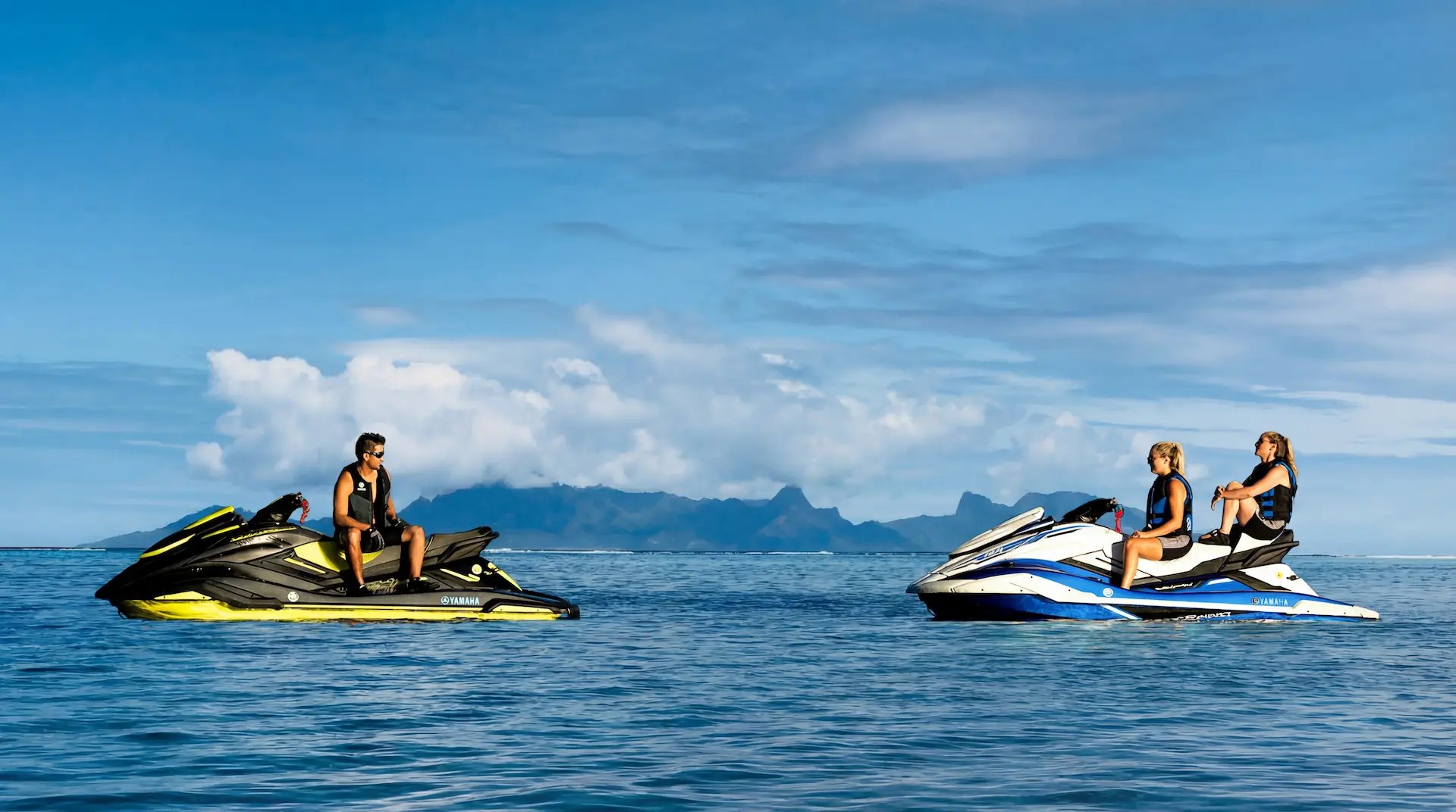 an abstract photo of a curved building with a blue sky in the background