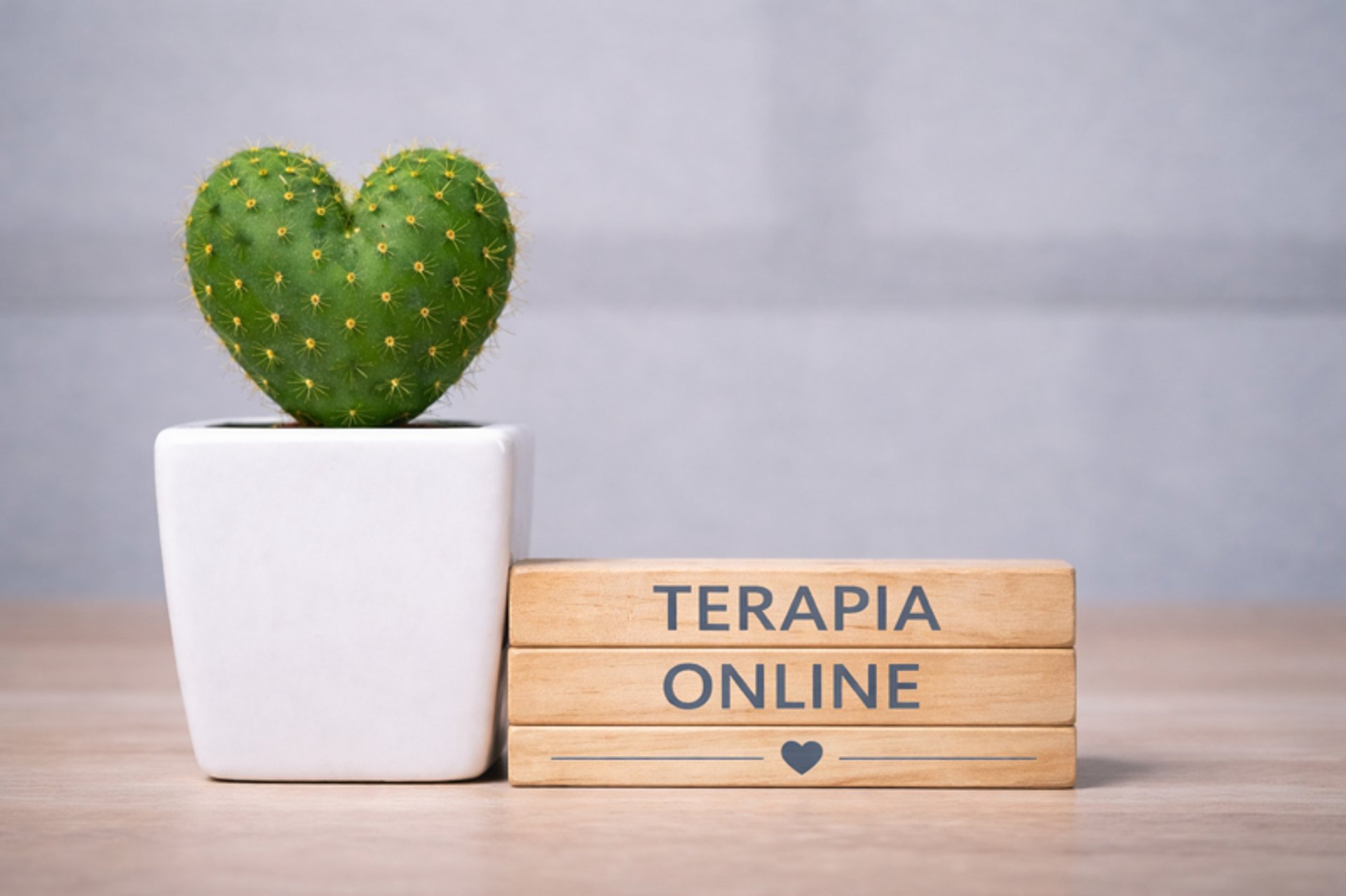 turned off MacBook Pro beside white ceramic mug filled with coffee