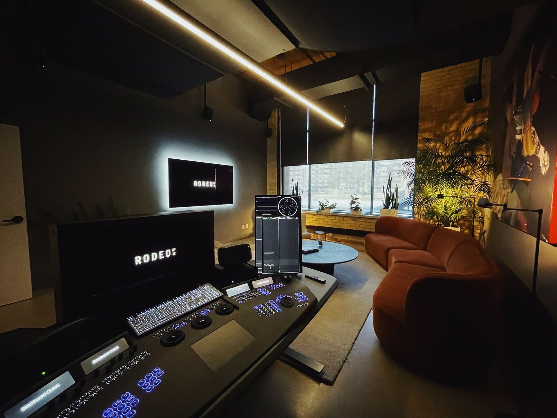 black and brown leather padded tub sofa