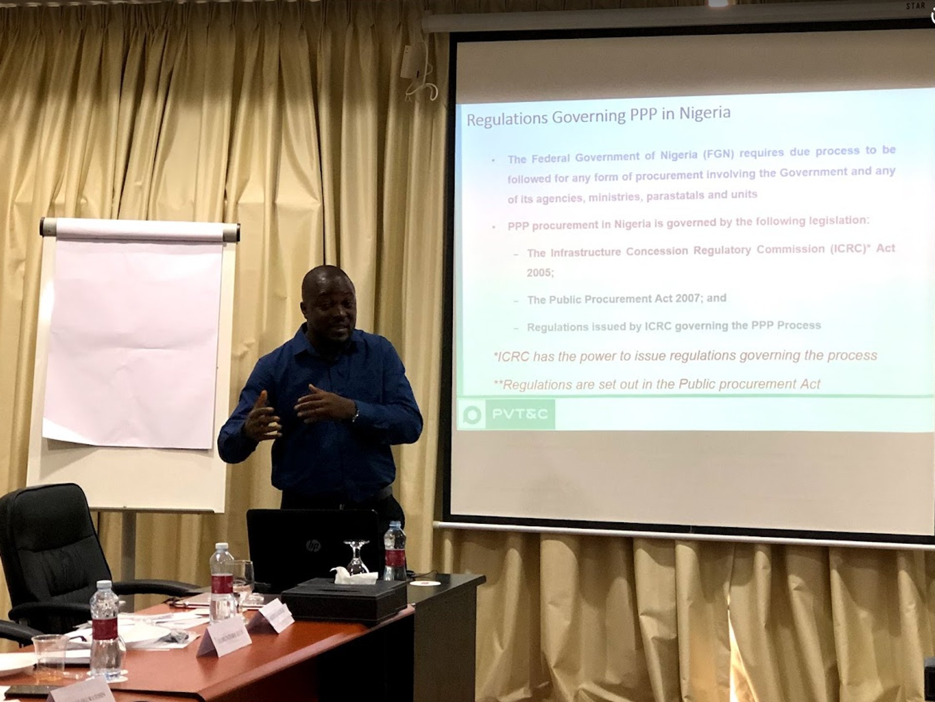 black and brown leather padded tub sofa