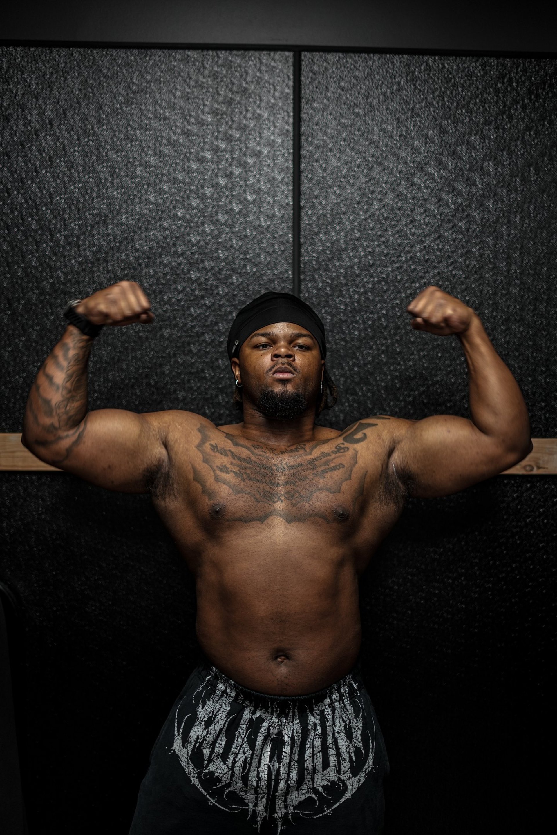 black and brown leather padded tub sofa