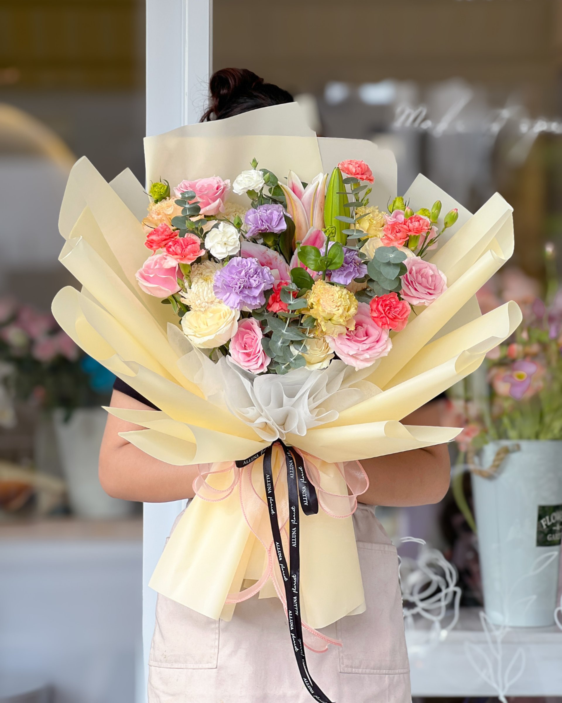 an abstract photo of a curved building with a blue sky in the background